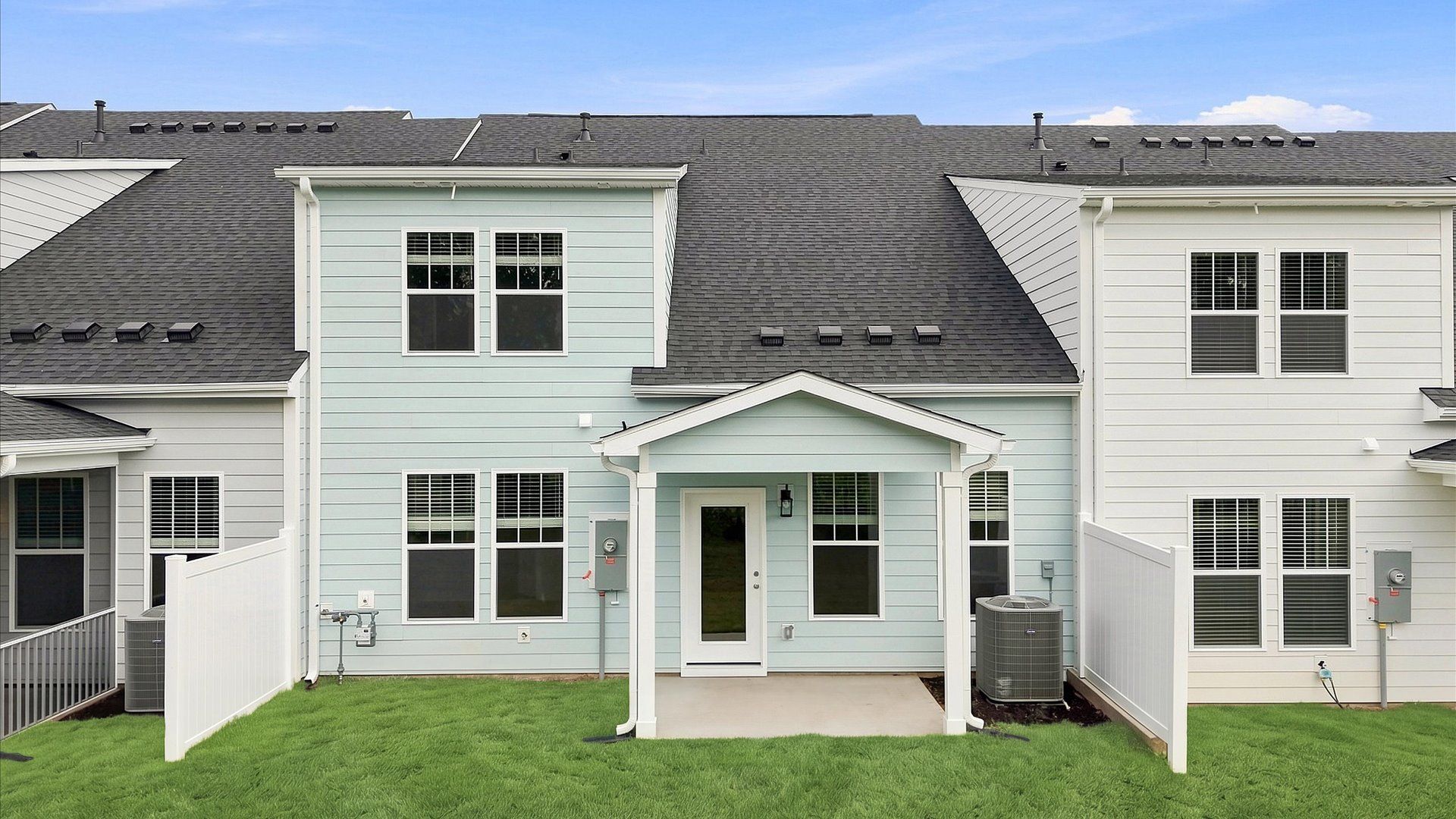 Vibrant rear outdoor space featuring a covered porch and exceptional craftsmanship in Anderson, SC