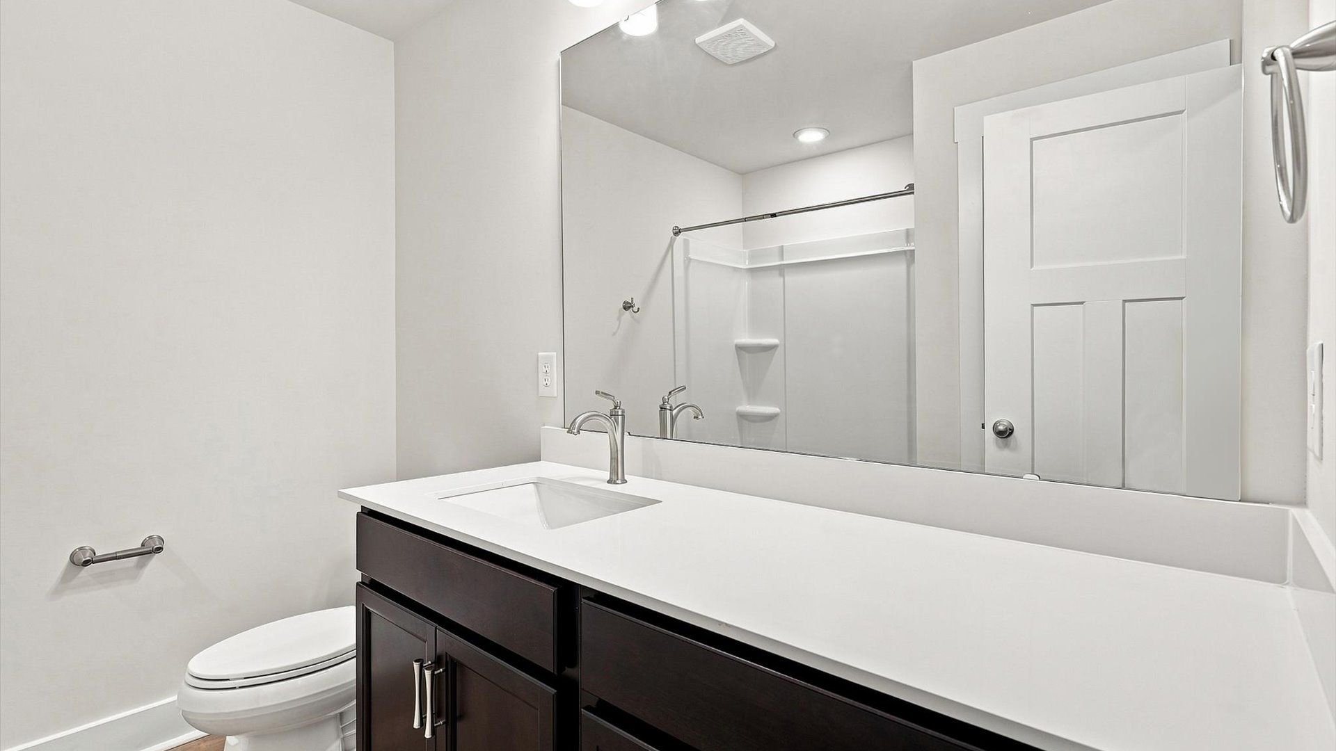 Stylish guest bathroom with superior design and thoughtful storage solutions