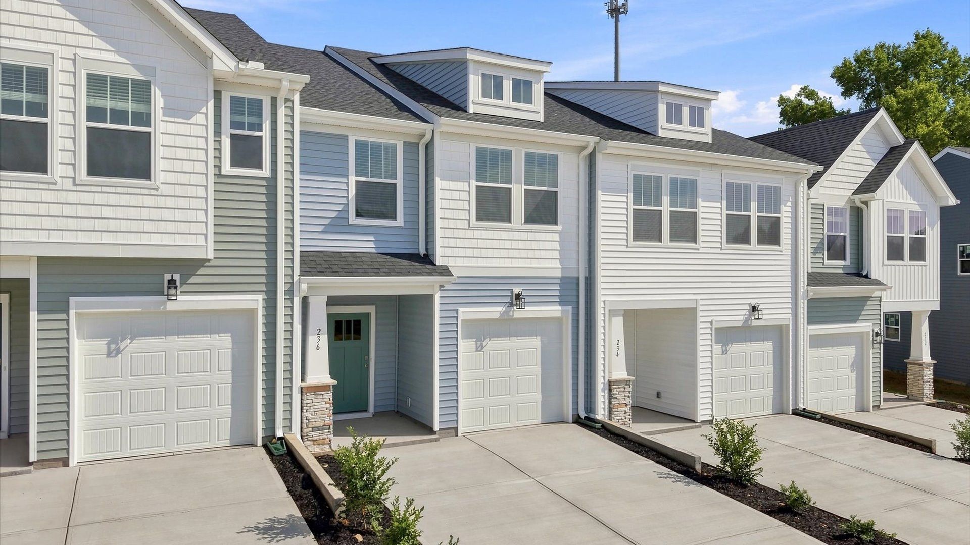 Desirable location and established charm in this superior two-story villa community near Downtown Anderson