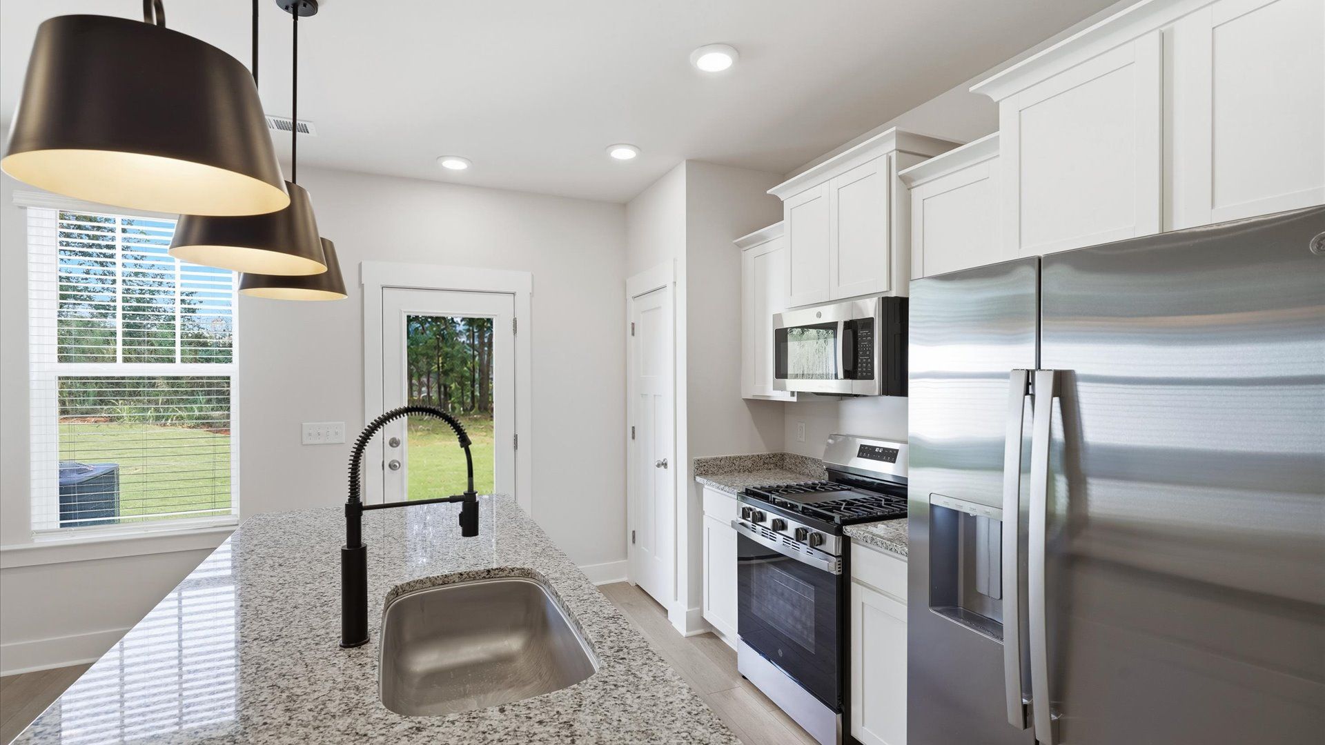 Elegant kitchen with modern finishes in this first-class villa at Silo Ridge near Downtown Anderson, SC
