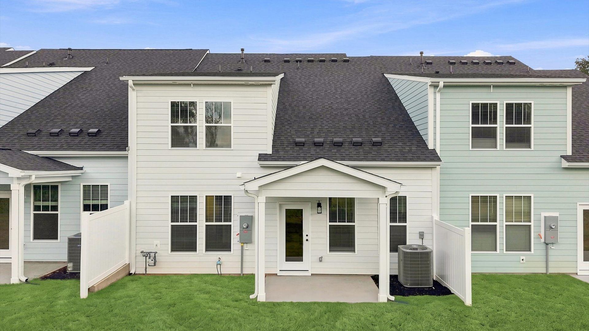 Superior curb appeal continues to the back with a refined, covered outdoor living space in Anderson, SC