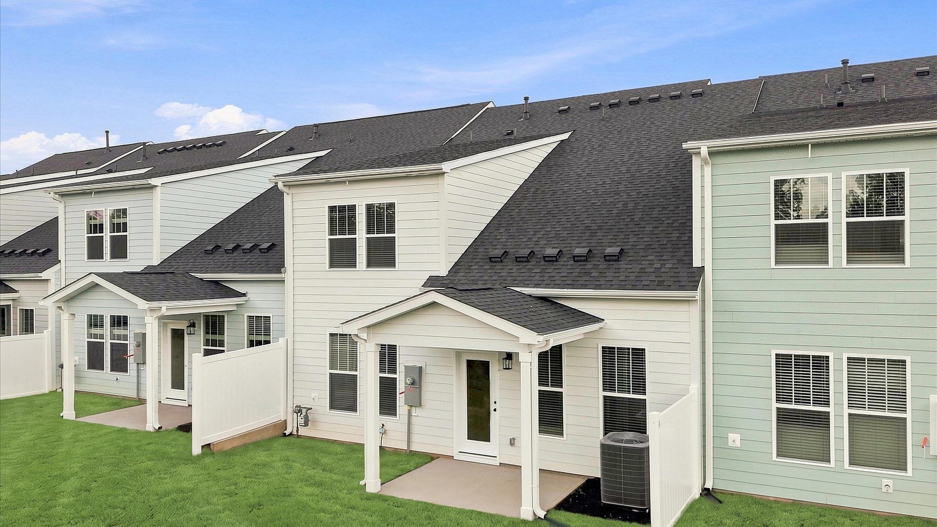Established charm meets functional outdoor living with a spacious rear covered porch at Village at Midway