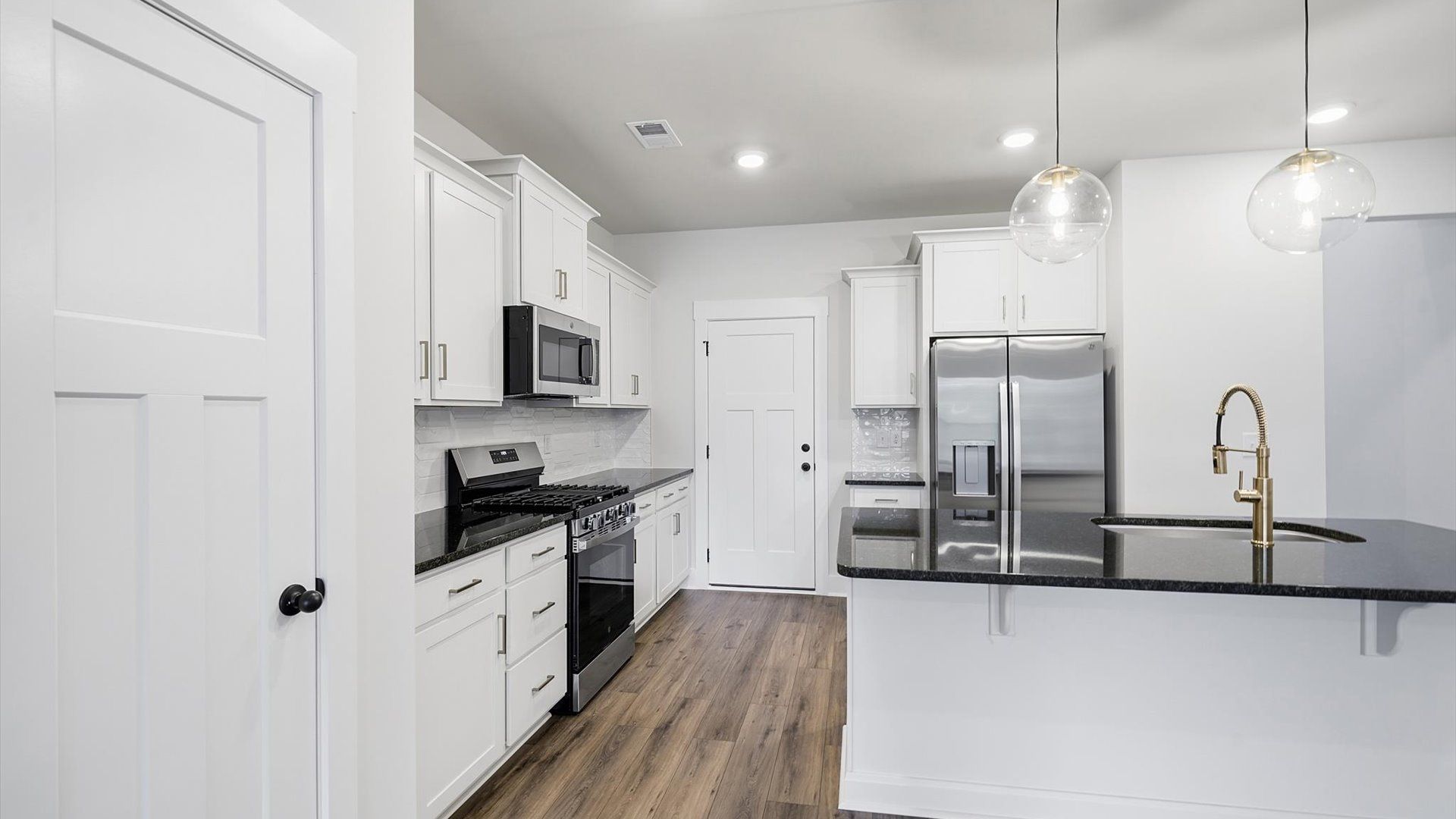 Accomplished layout with a first-class kitchen in this select villa community by DRB Homes