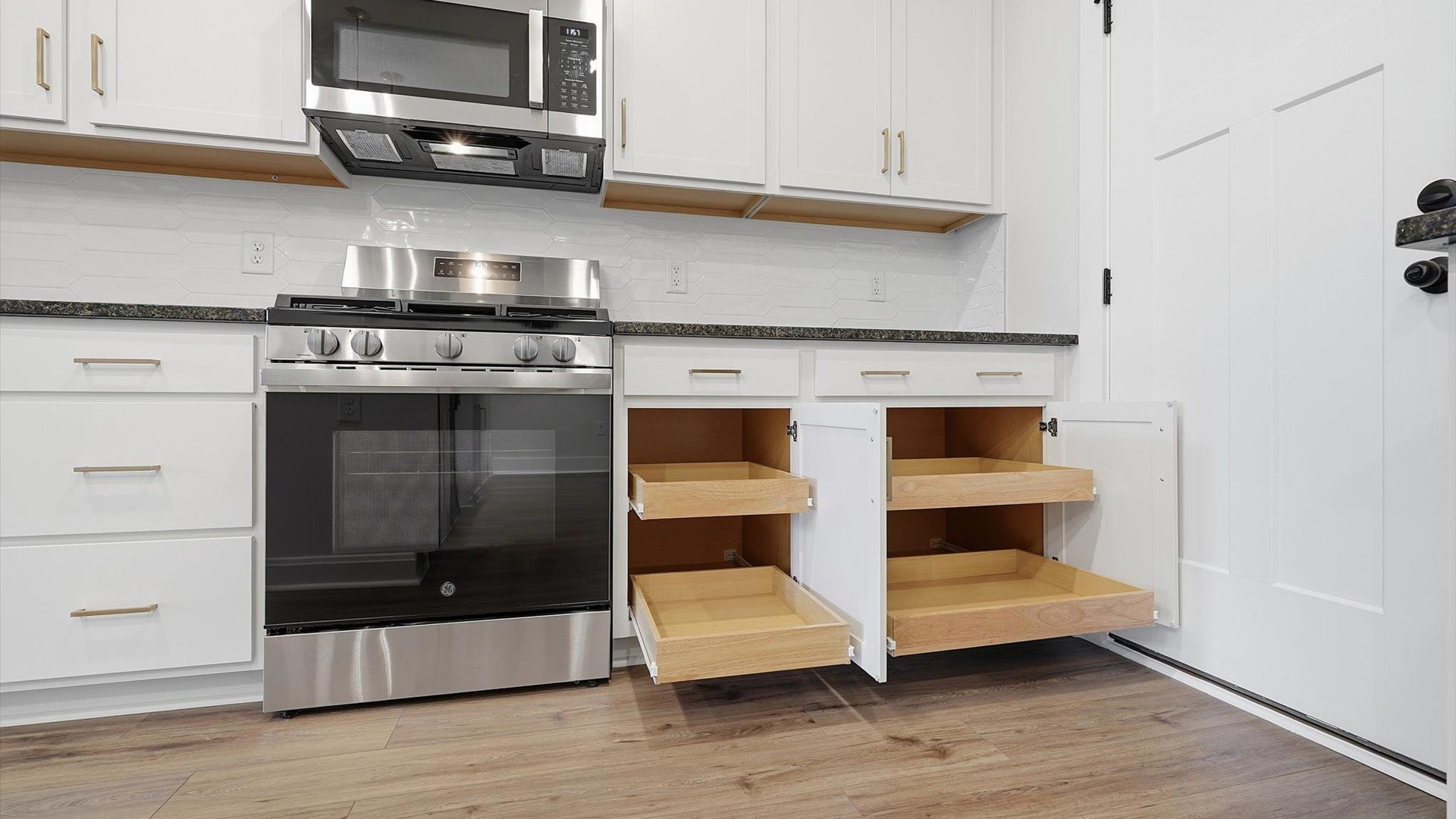 Elegant kitchen with modern finishes in this first-class villa at Village at Midway near Downtown Anderson, SC