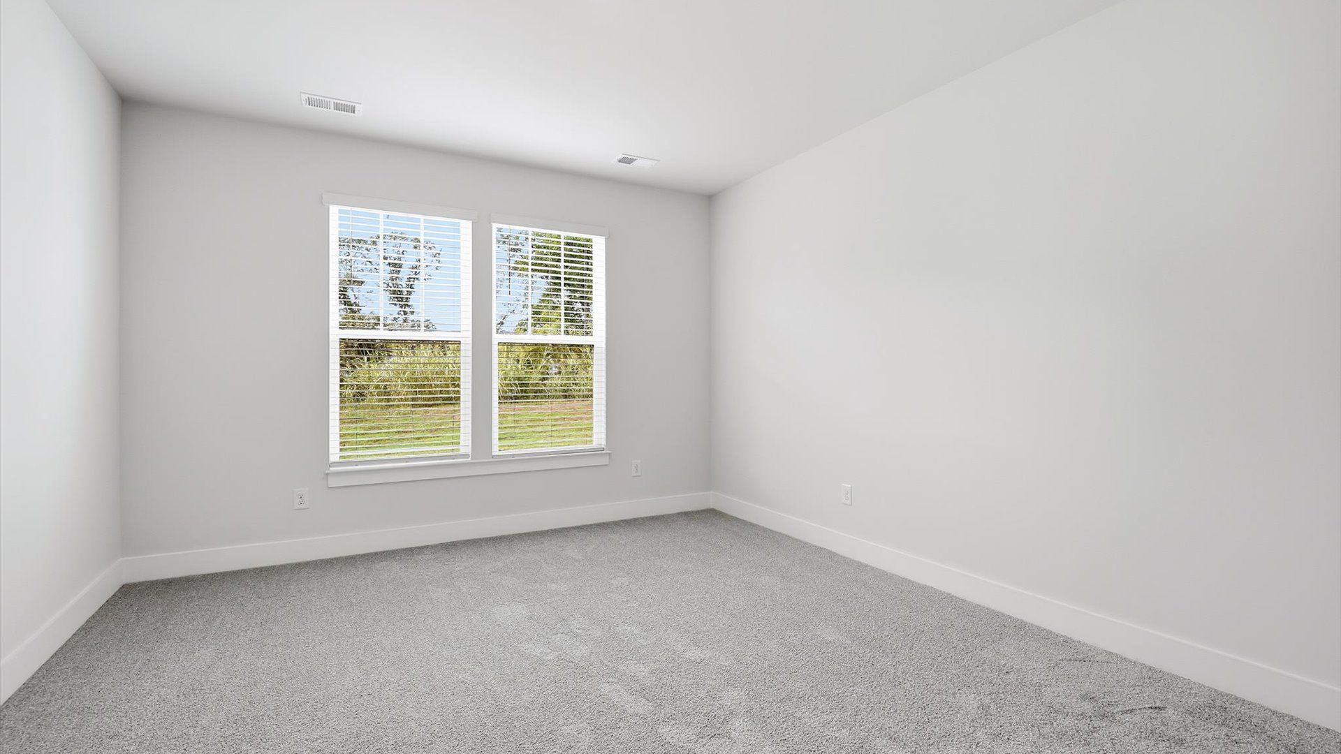 Memorable mornings begin in this tasteful and thoughtfully crafted primary suite near Downtown Anderson