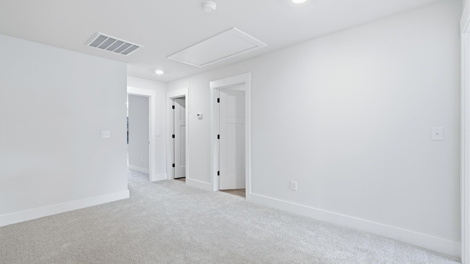 Inviting loft with cozy carpet, perfect for casual gatherings or quiet relaxation in Anderson, SC