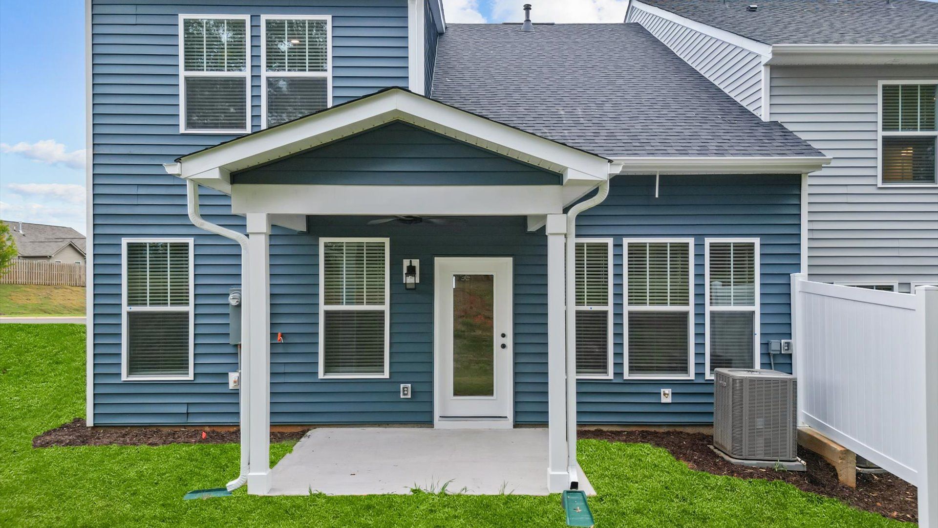 Exclusive end-unit townhome in Aspen Ridge with elegant design and high standards