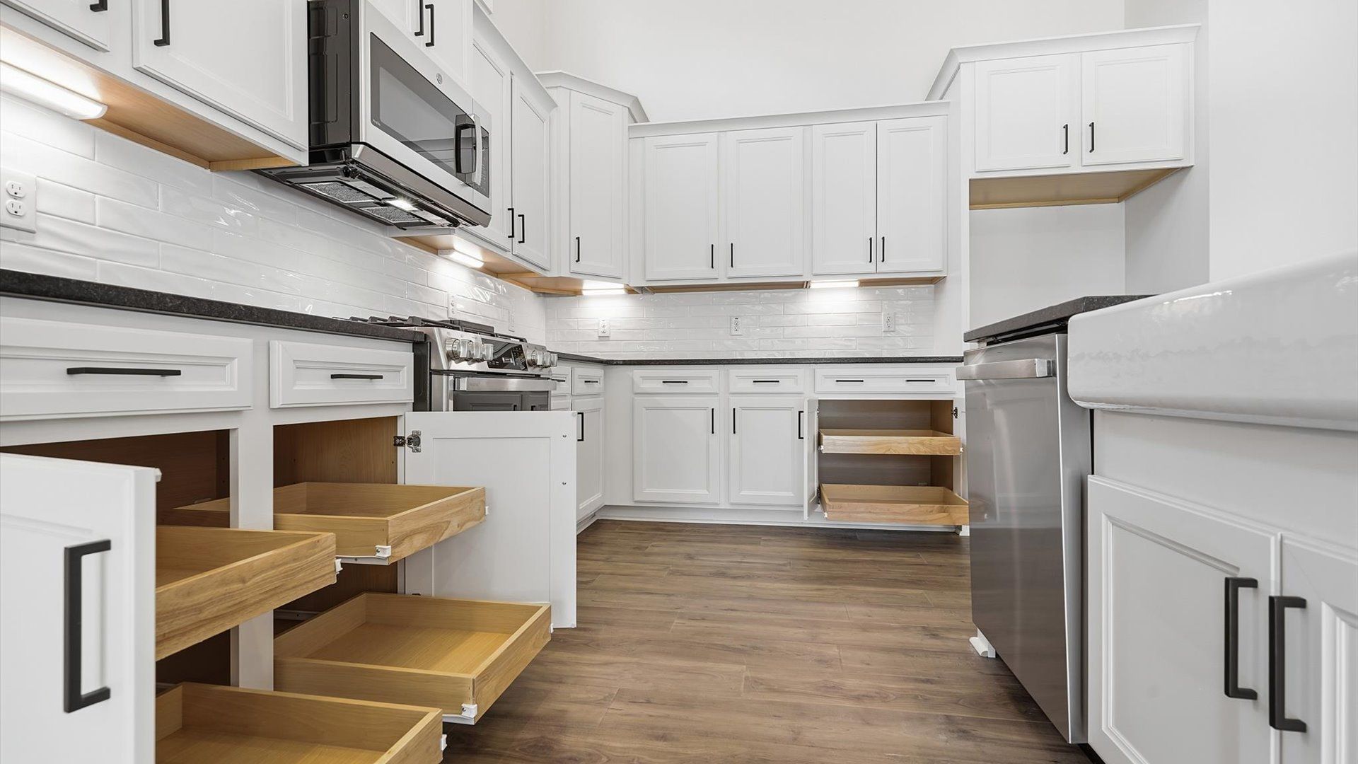 Elegant kitchen with large island in this first-class DRB Homes design