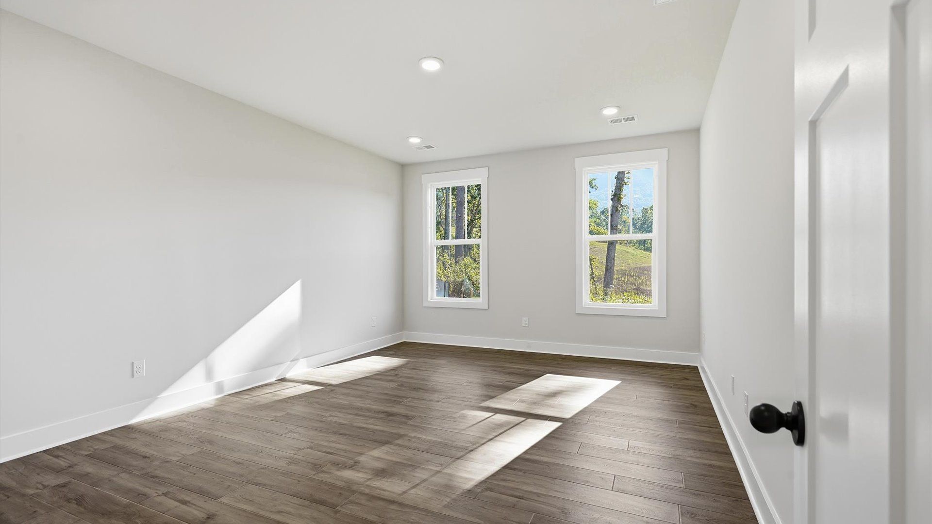 Memorable mornings begin in this tasteful and thoughtfully crafted primary suite
