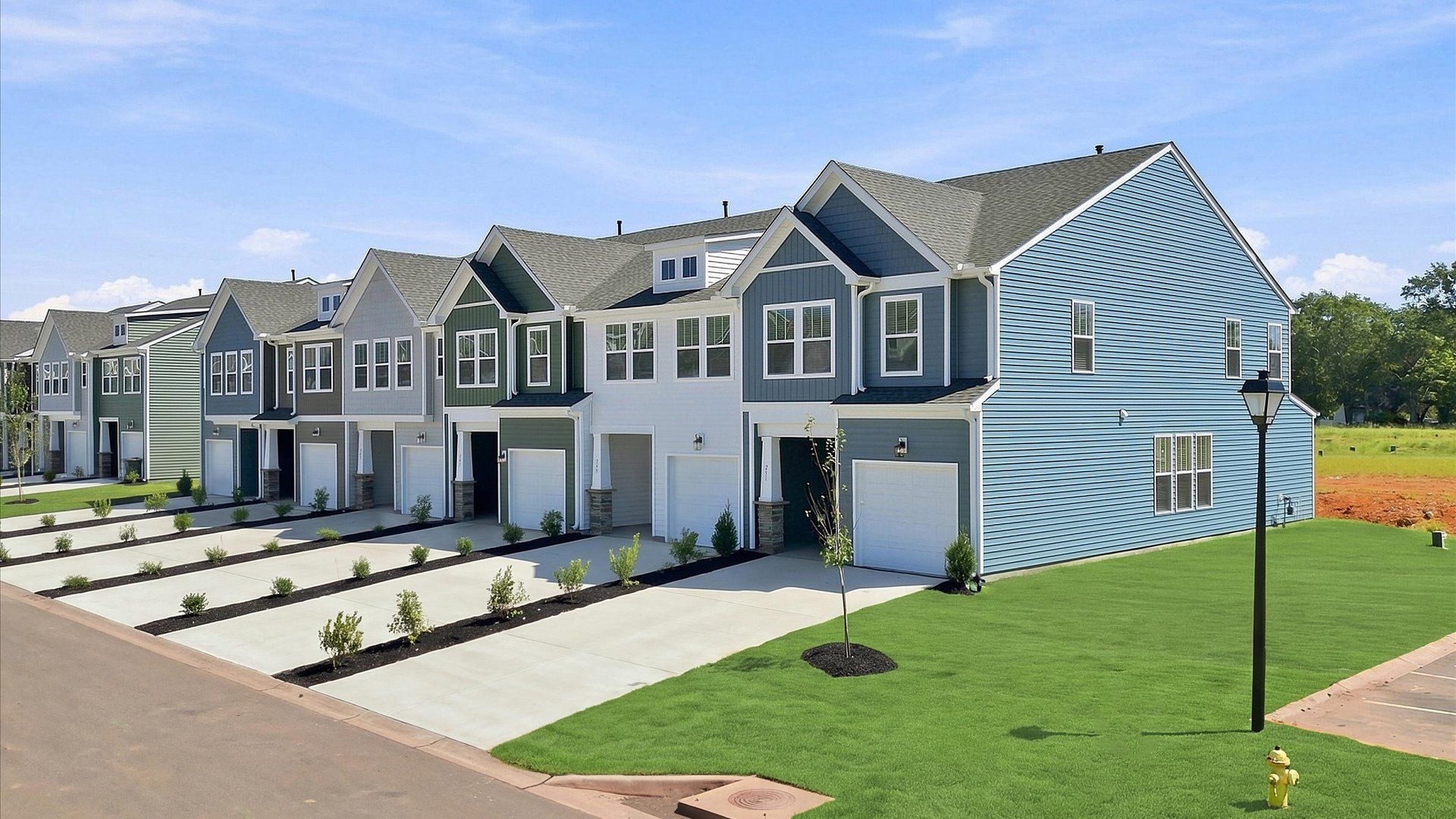 Refined exterior design with balanced architectural detail in this distinguished two-story villa in Piedmont, SC