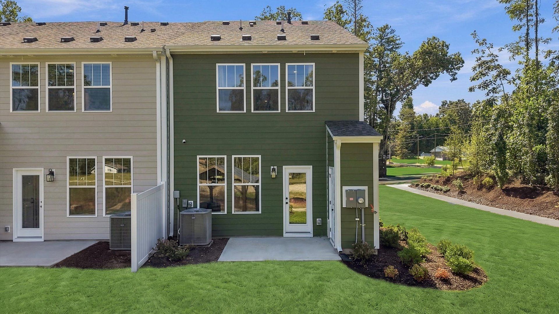 Superior curb appeal continues to the back with a refined and private backyard space at the new Brookland Place community