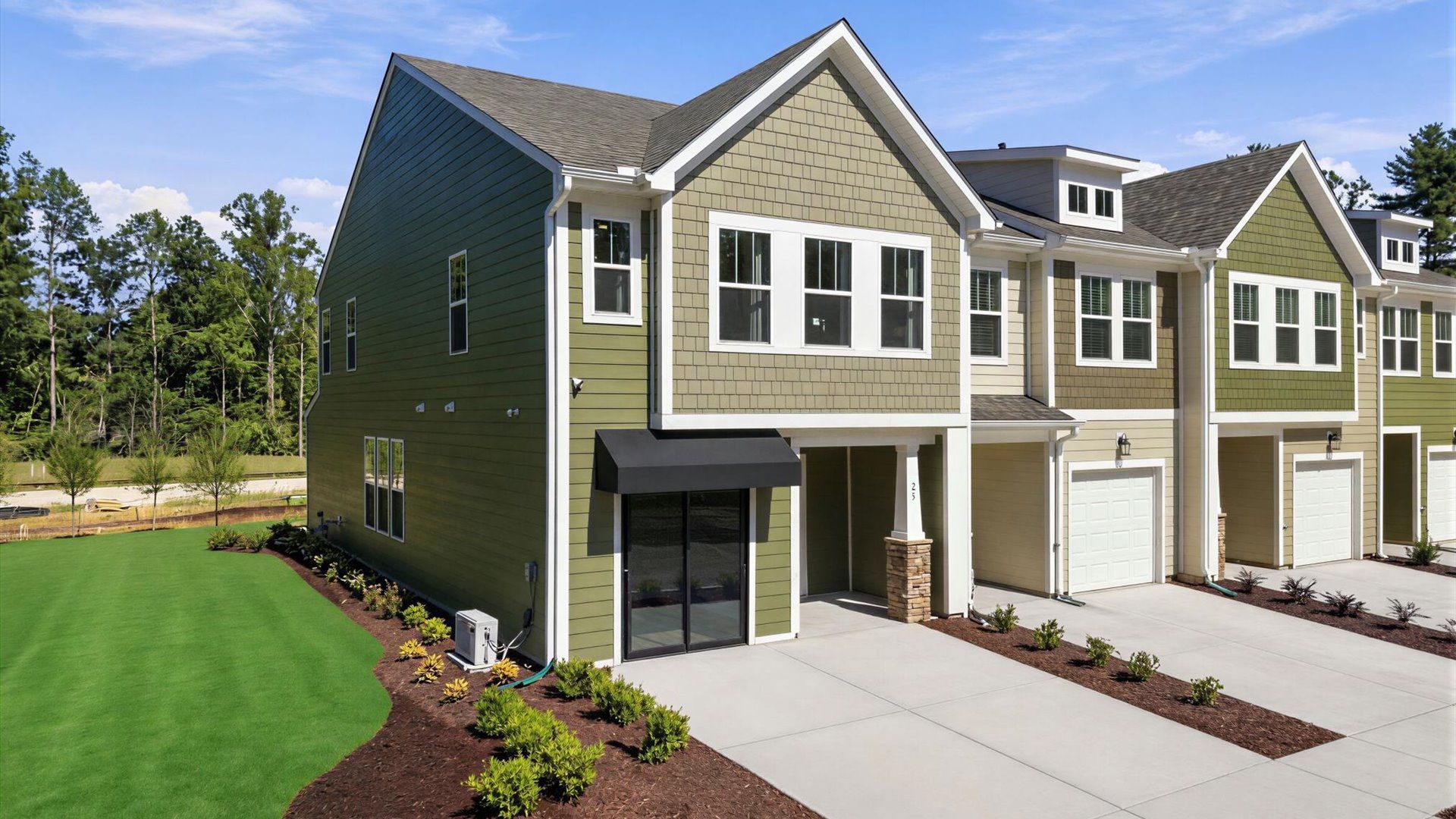 Exclusive DRB Homes exterior with balanced proportions and vibrant curb appeal at the new Brookland Place community