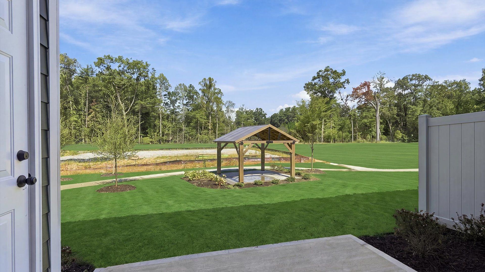 Exclusive backyard with a private patio with accomplished detail and elevated outdoor living potential at Brookland Place