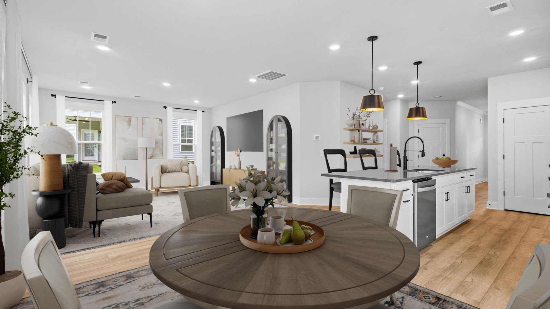 Neroli home plan open concept kitchen, living room and breakfast area with LVP flooring