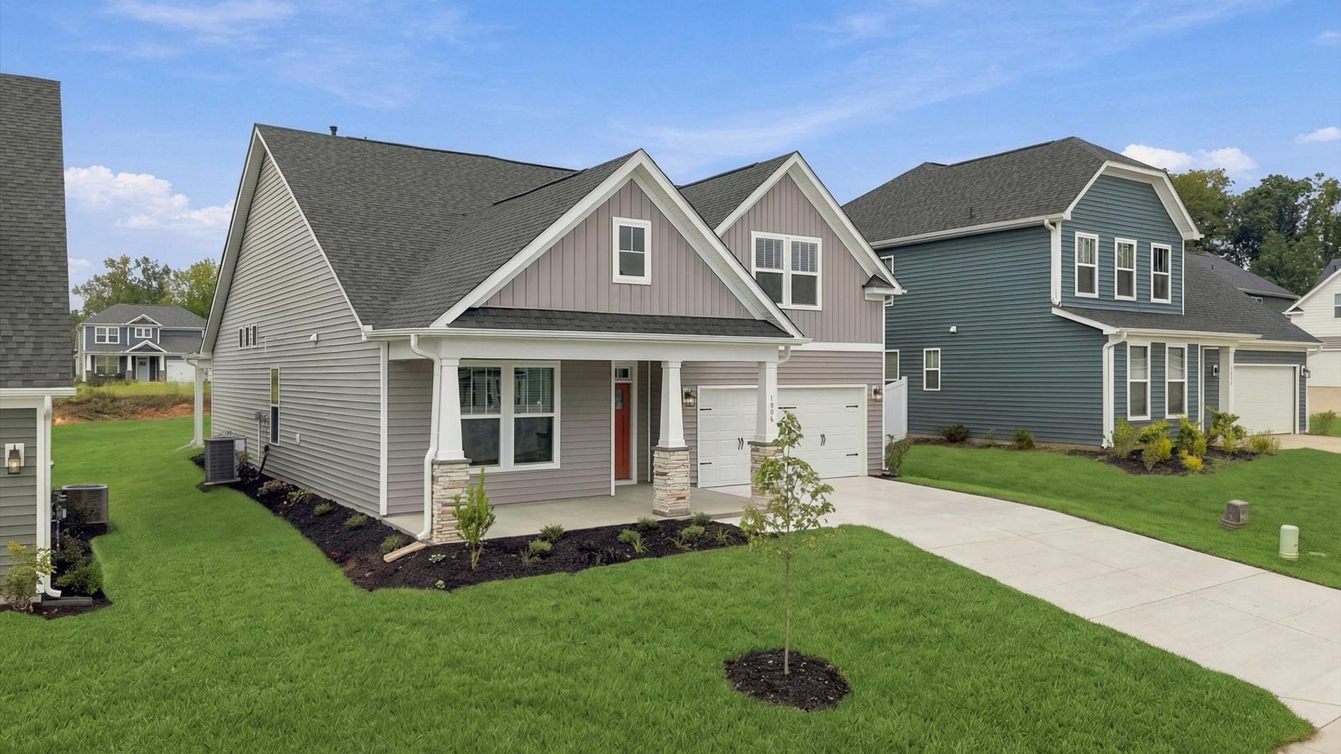 Refined exterior design with balanced architectural detail in this distinguished two-story home by DRB Homes