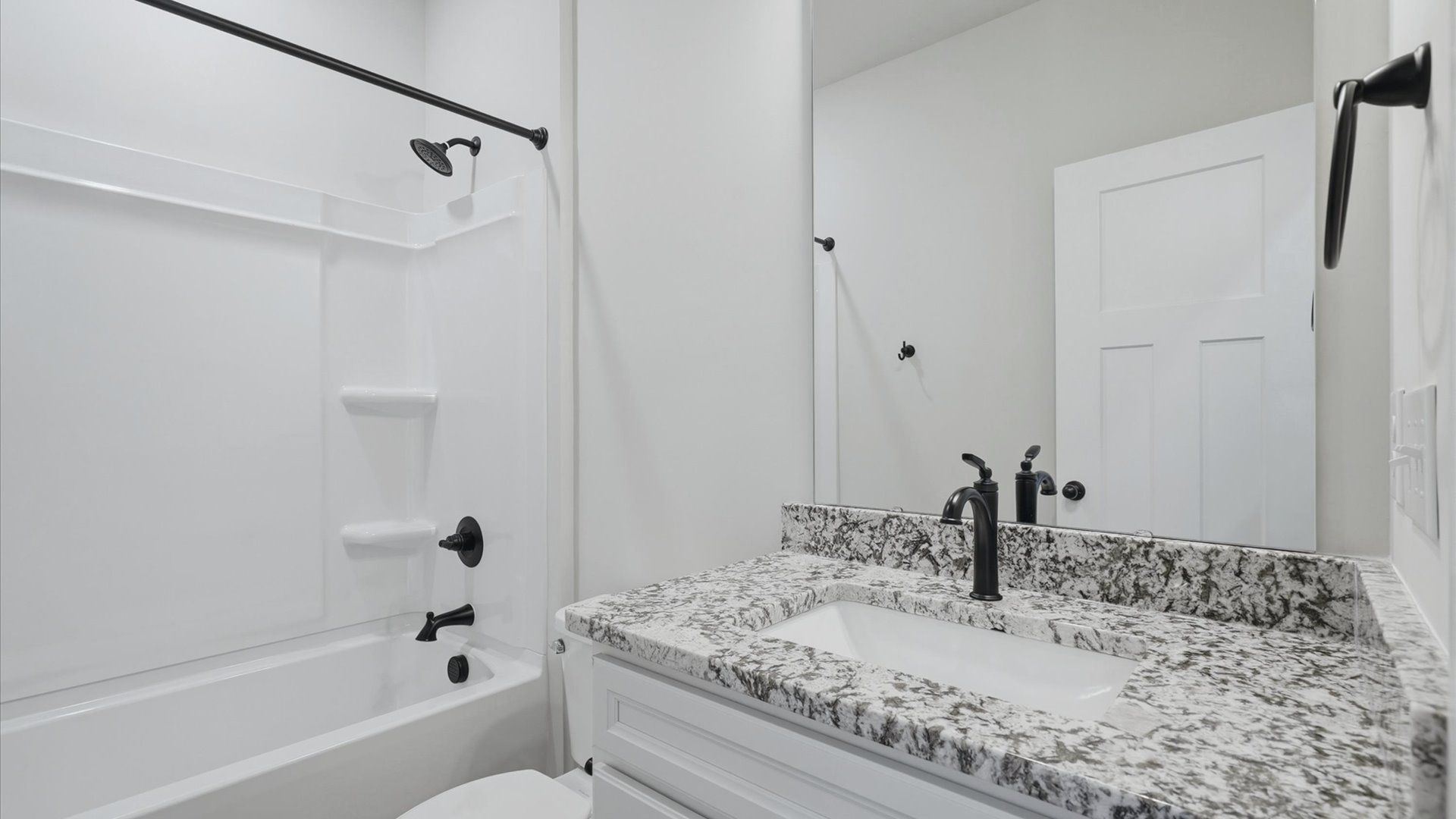 Top-notch bathroom with current fixtures, tasteful materials, and elevated charm at Fox Hollow