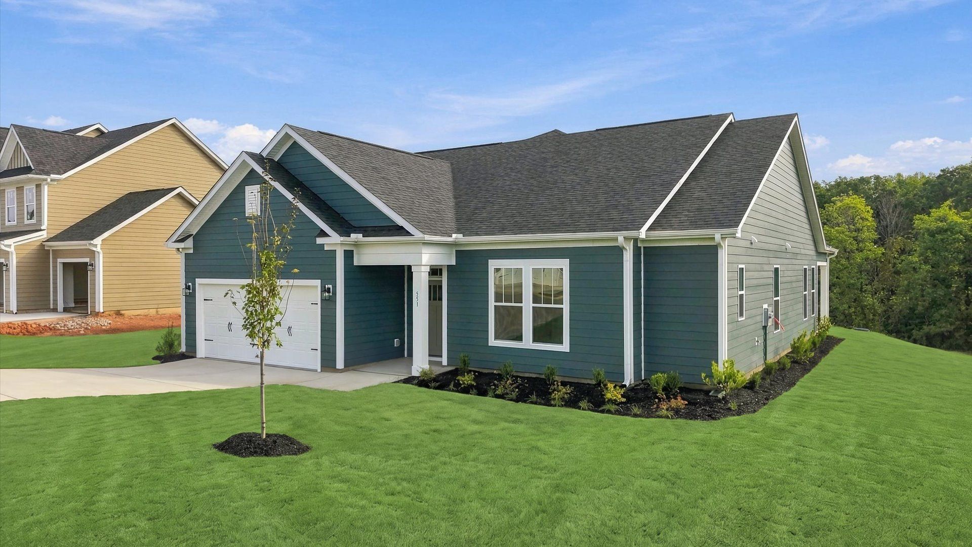 Refined exterior design with balanced architectural detail in this distinguished two-story home by DRB Homes