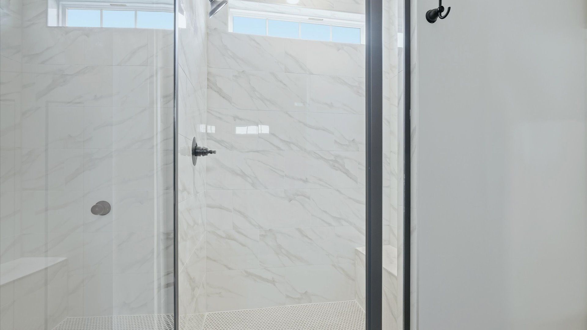 Superior en-suite primary bathroom with stylish walk-in shower—crafted with high standards in mind in Woodruff, SC