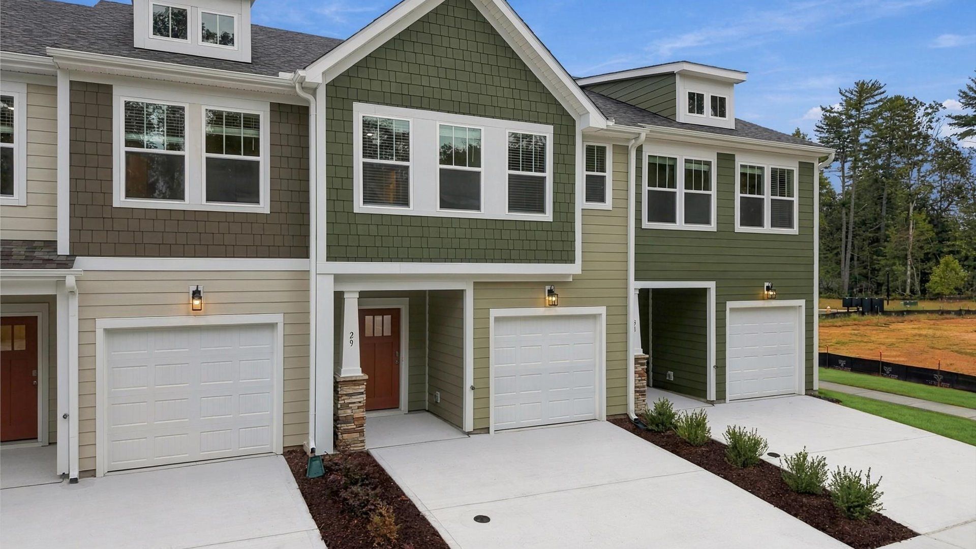 Exclusive DRB Homes exterior with balanced proportions and vibrant curb appeal at Brookland Place