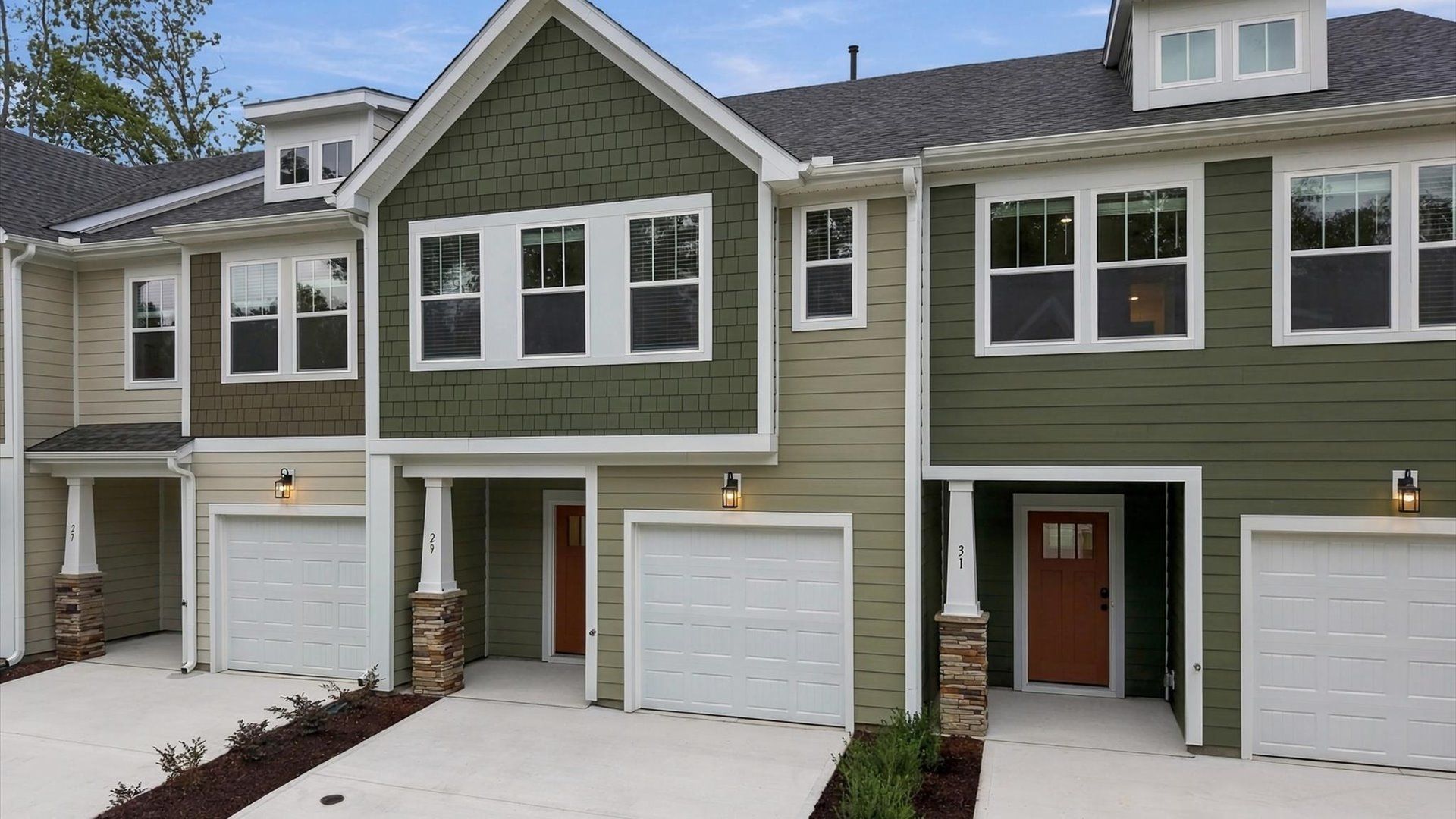 Refined exterior design with balanced architectural detail in this distinguished two-story villa by DRB Homes