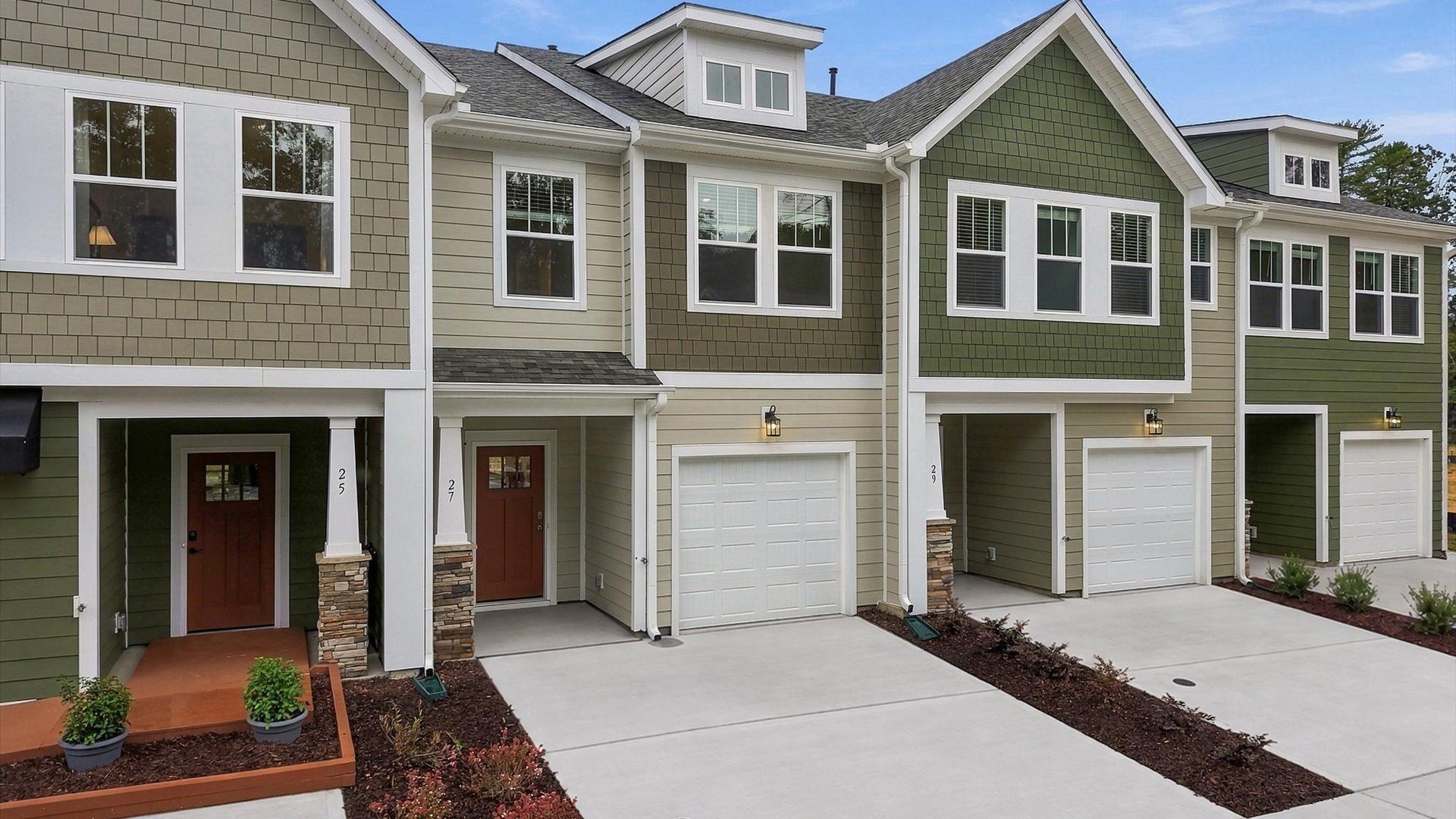 Exceptional home with tasteful exterior finishes and a thoughtfully designed façade by DRB Homes