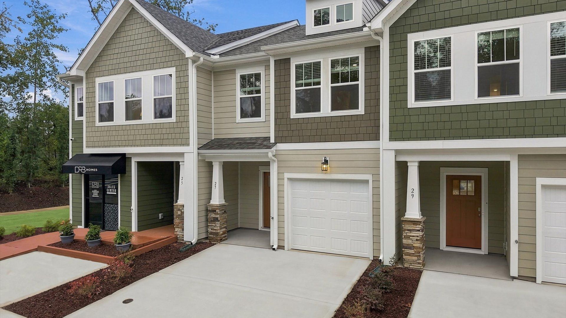 Vibrant home exterior in a thoughtfully planned community near city conveniences in Hendersonville, NC