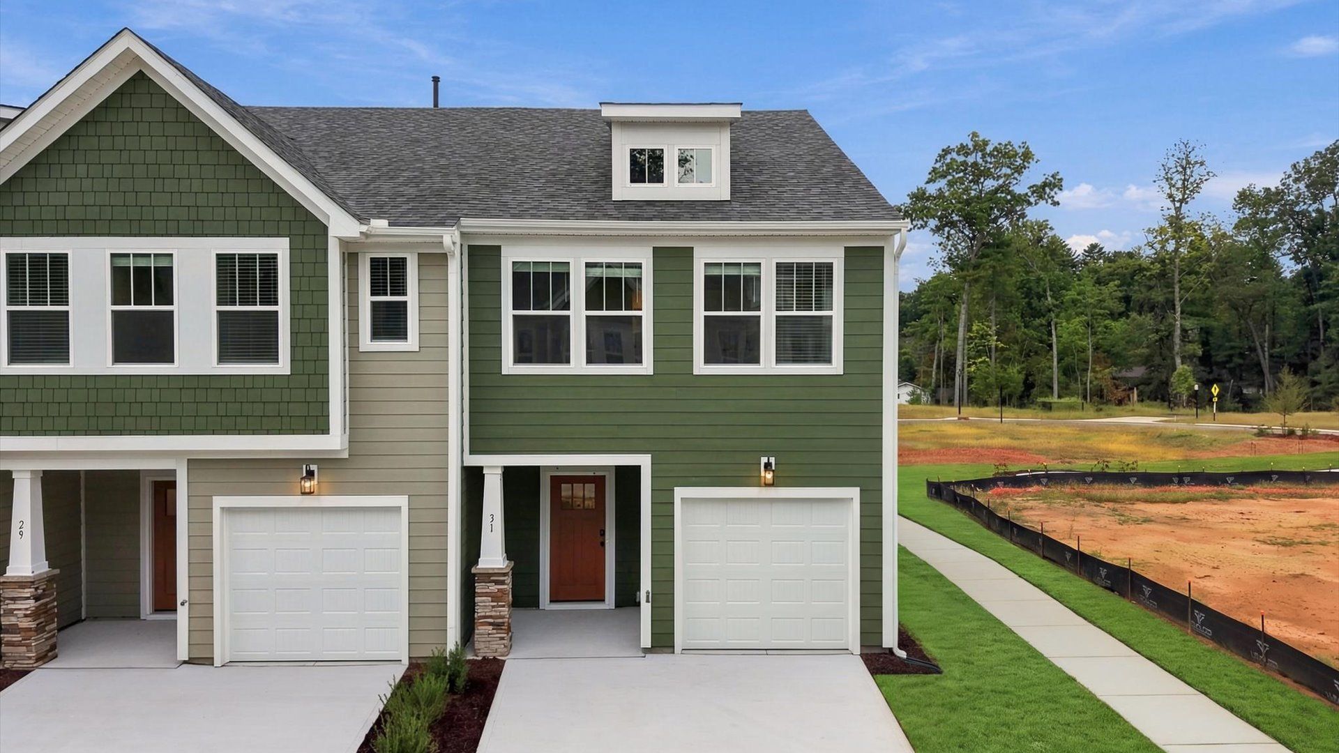 Exceptional home with tasteful exterior finishes and a thoughtfully designed façade at Brookland Place