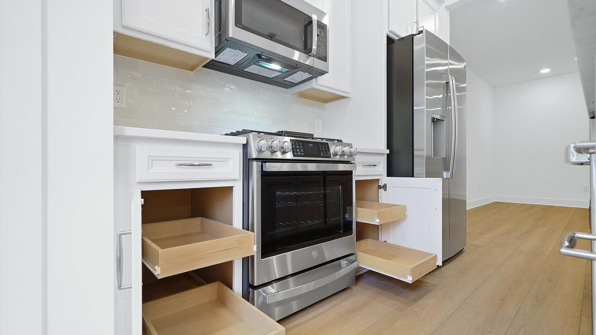 Tasteful kitchen with ample storage and modern finishes in a first-class DRB Homes design