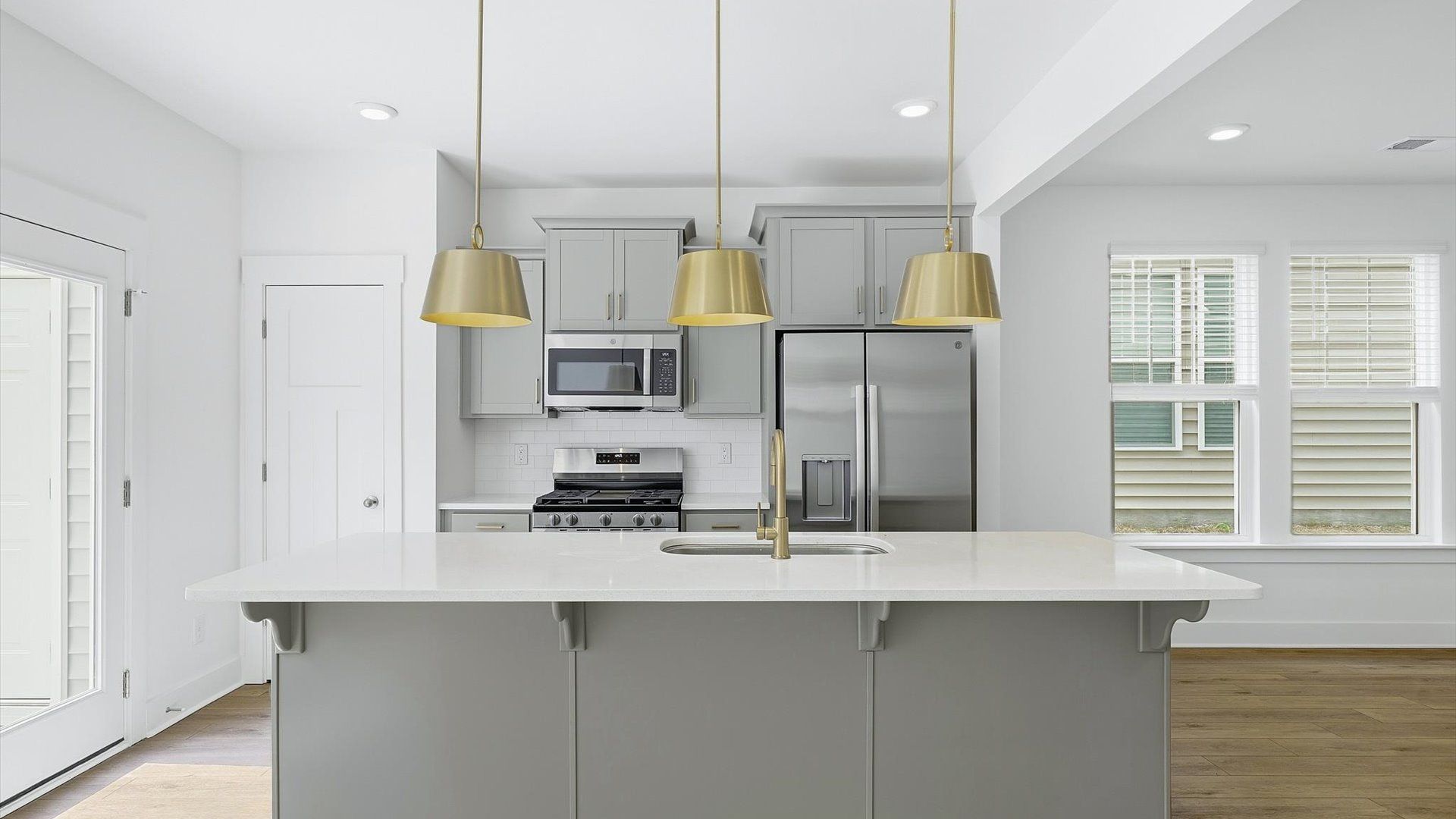 First-class finishes and a thoughtfully scaled island highlight this elegant kitchen space at El Dorado