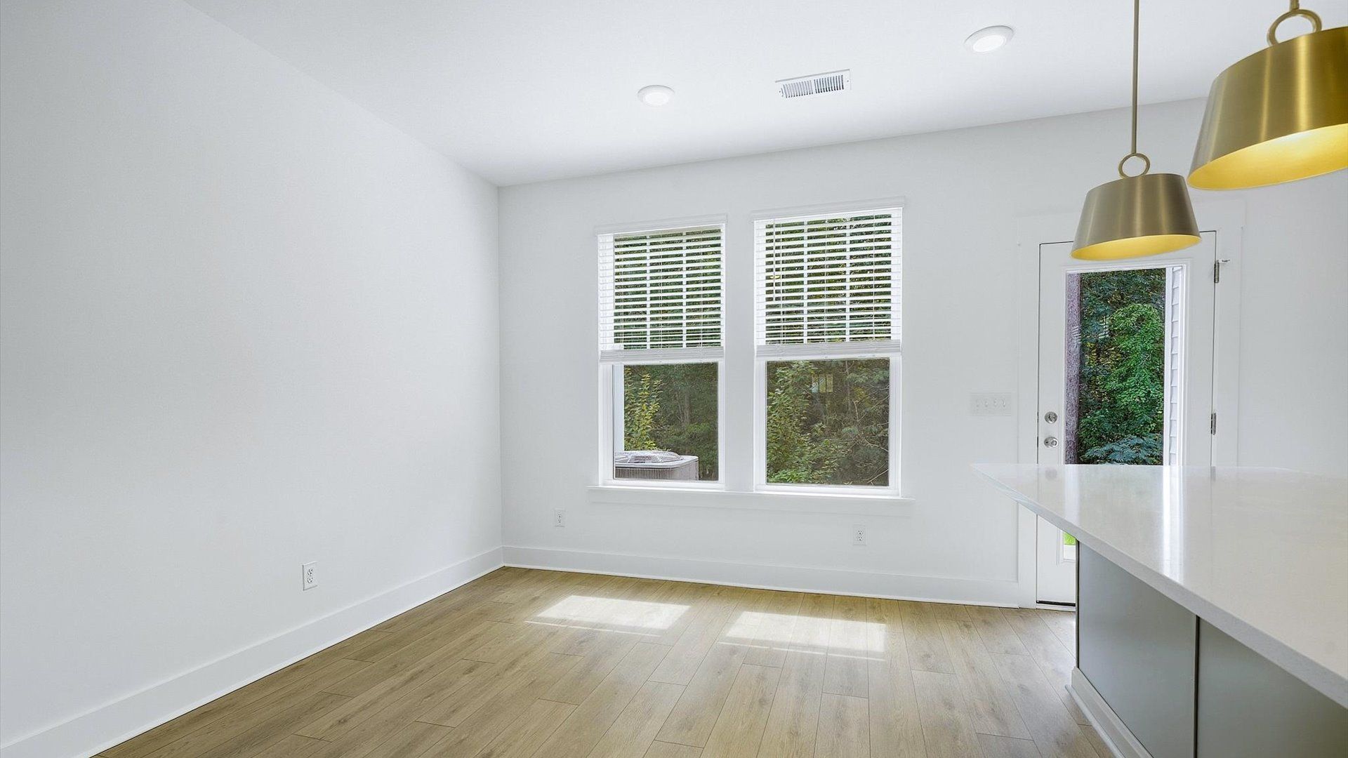 Light-filled breakfast area offering a comfortable space to gather and unwind located in Spartanburg, SC