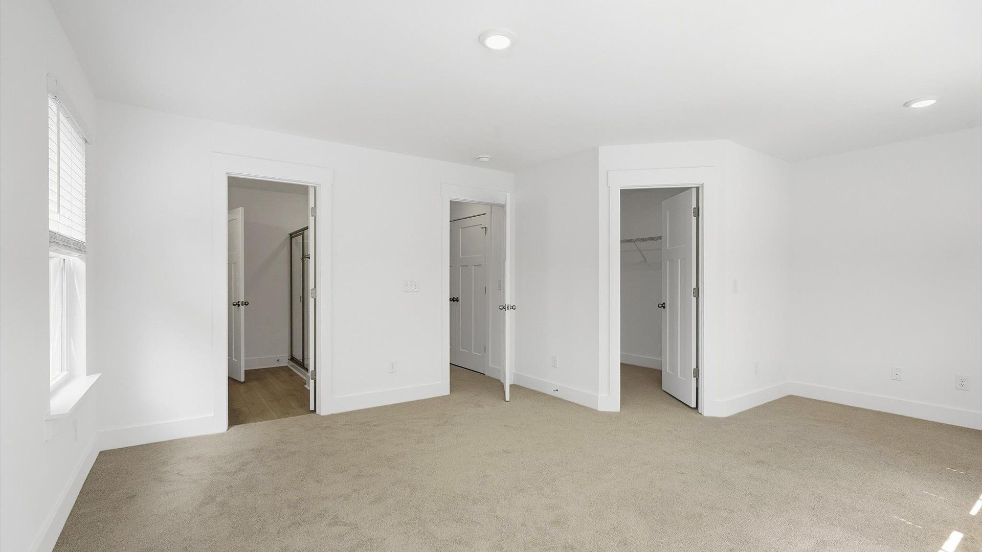 Highly skilled design shines in this elegant, restful primary suite near Downtown Spartanburg