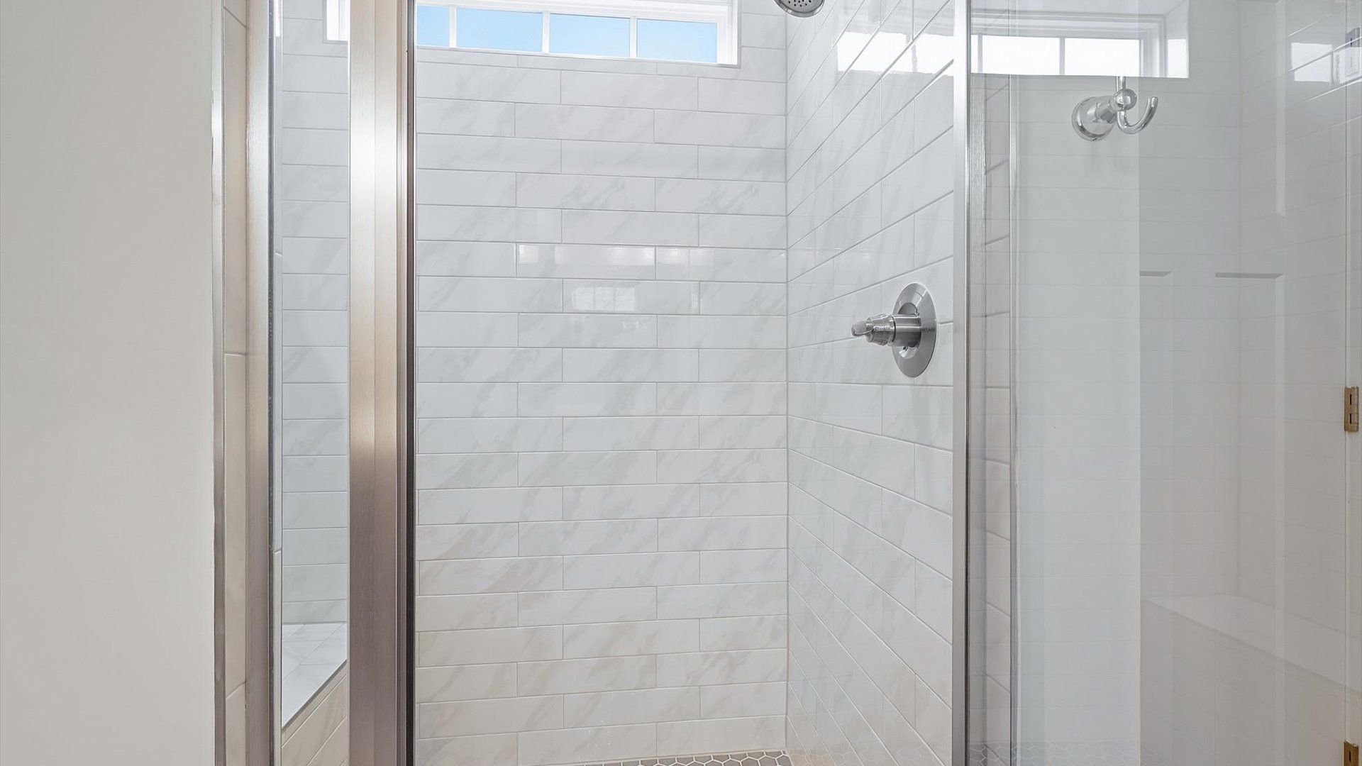 Tasteful primary bath with modern finishes, a walk-in shower, and natural light located in Piedmont, SC