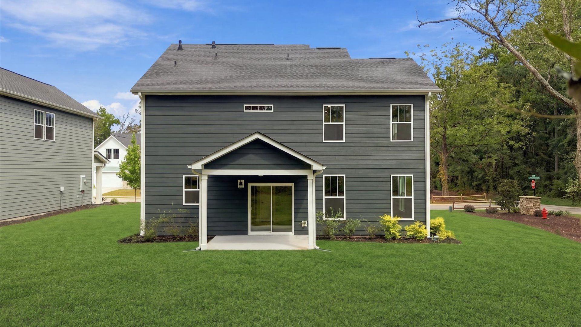 Established charm meets functional outdoor living with a spacious rear covered porch by DRB Homes