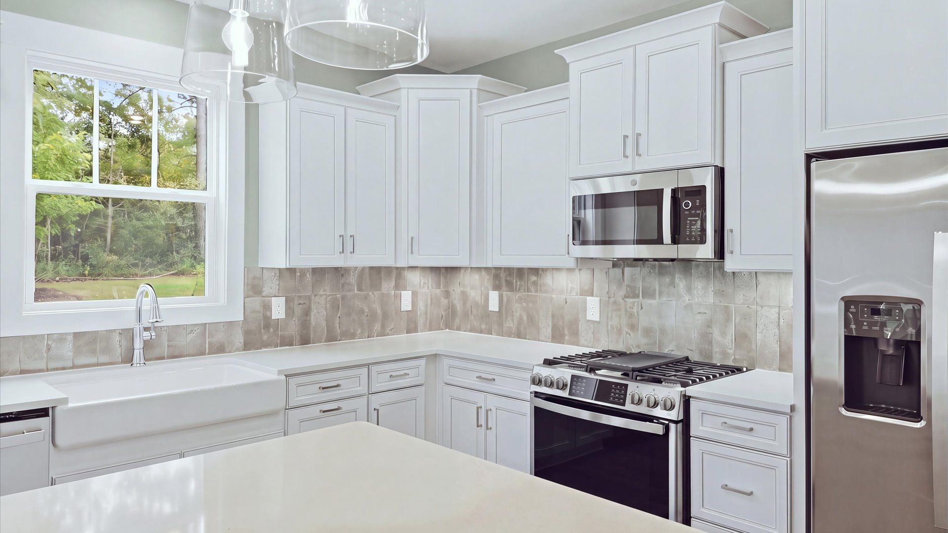Elegant kitchen with modern finishes in this first-class home at Creeks at Midway near Downtown Anderson, SC