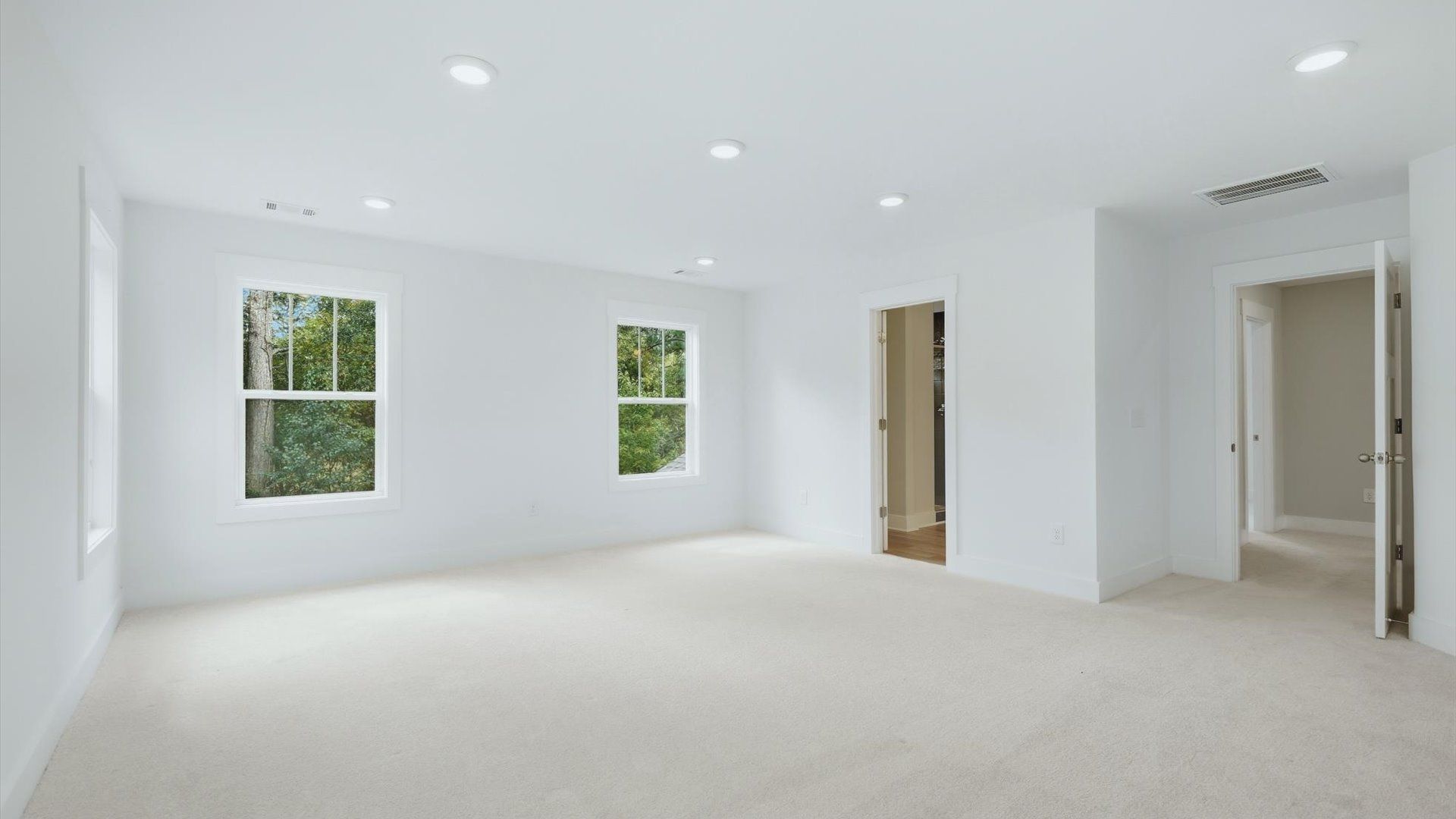 Spacious and serene primary suite with thoughtful design in a desirable DRB Homes community