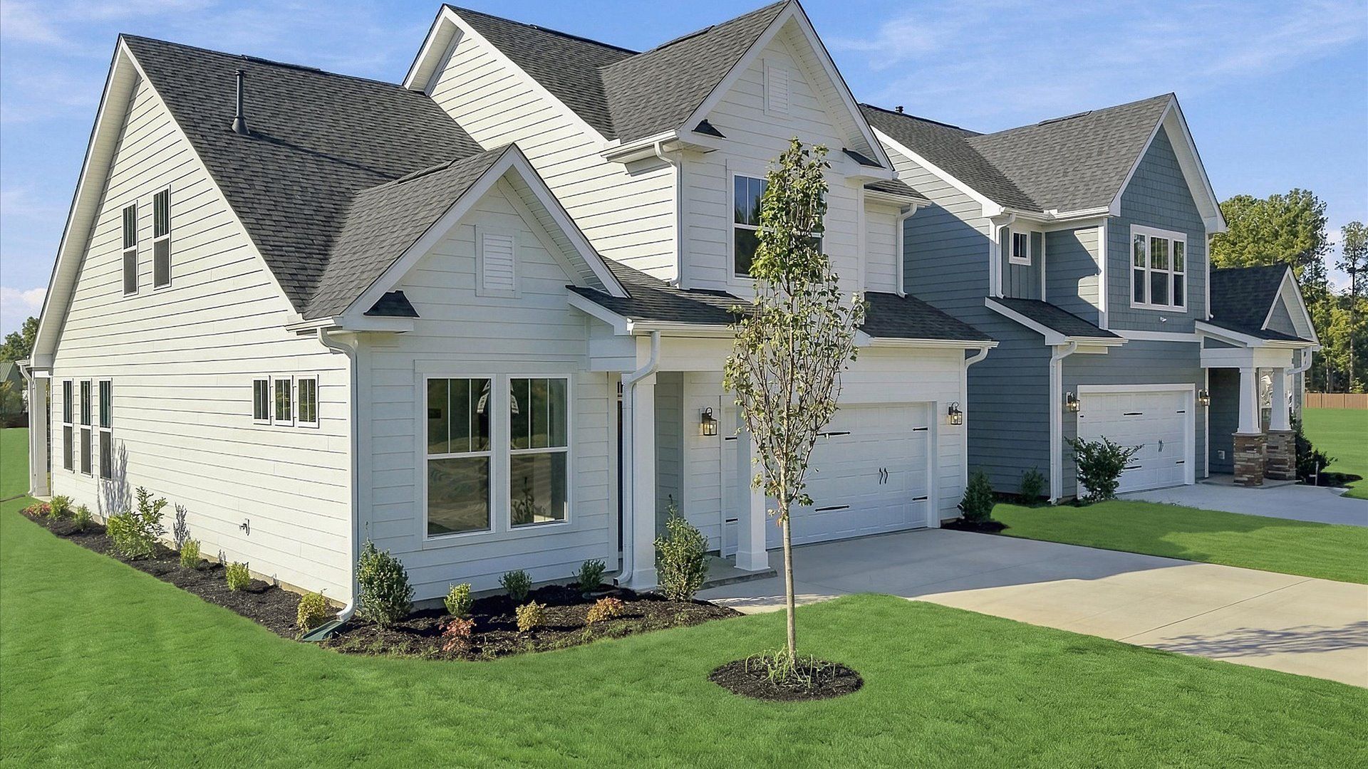 Notable street presence with tasteful elevation and thoughtful landscaping at the Barton Hollow community