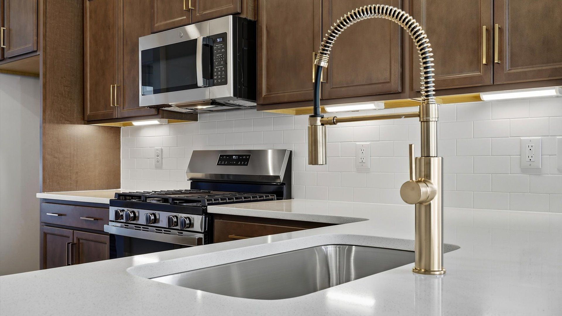 Elegant kitchen with modern finishes in this first-class townhome at Barton Hollow near Downtown Fountain Inn, SC