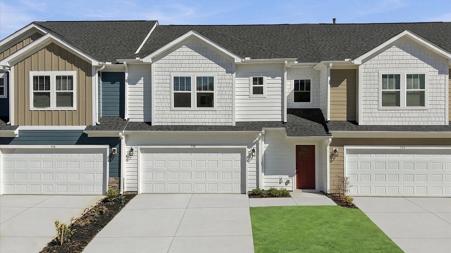 Exclusive DRB Homes exterior with balanced proportions and vibrant curb appeal at Barton Hollow