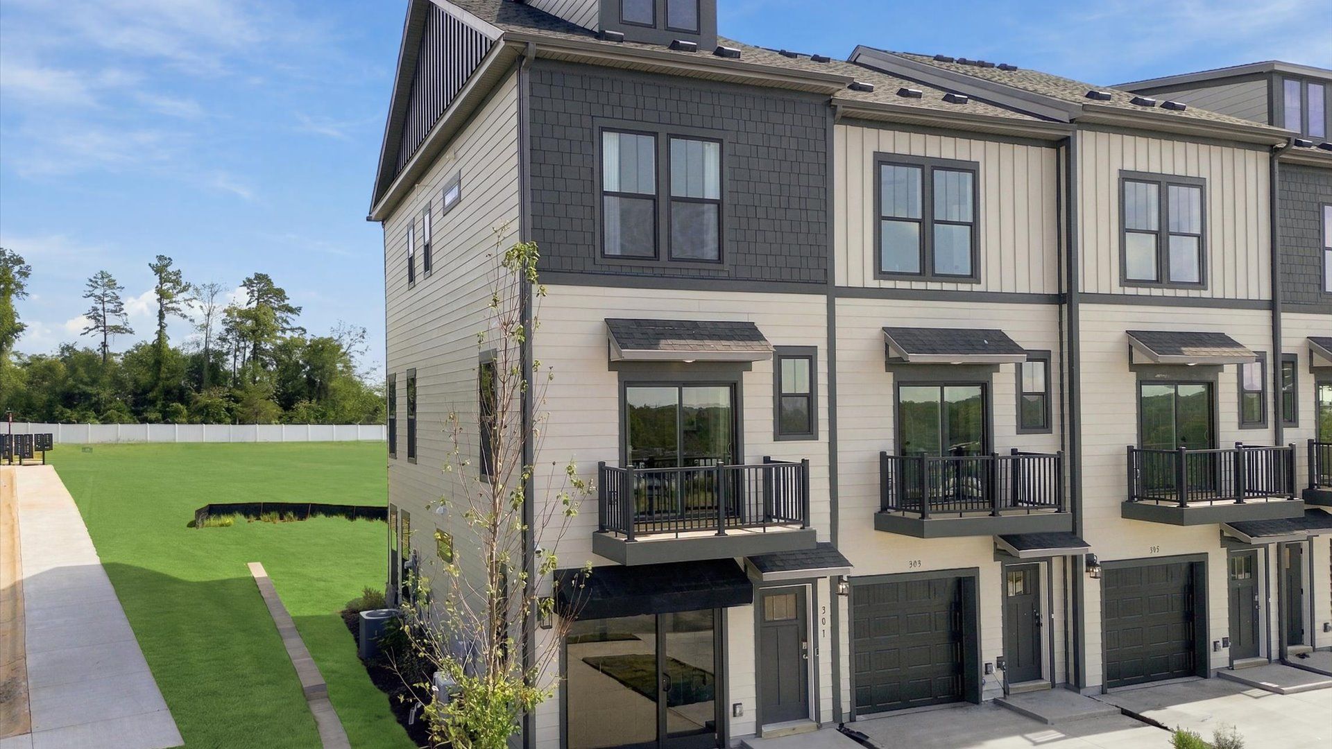 Desirable location and established charm in this superior three-story villa community near Downtown Greenville