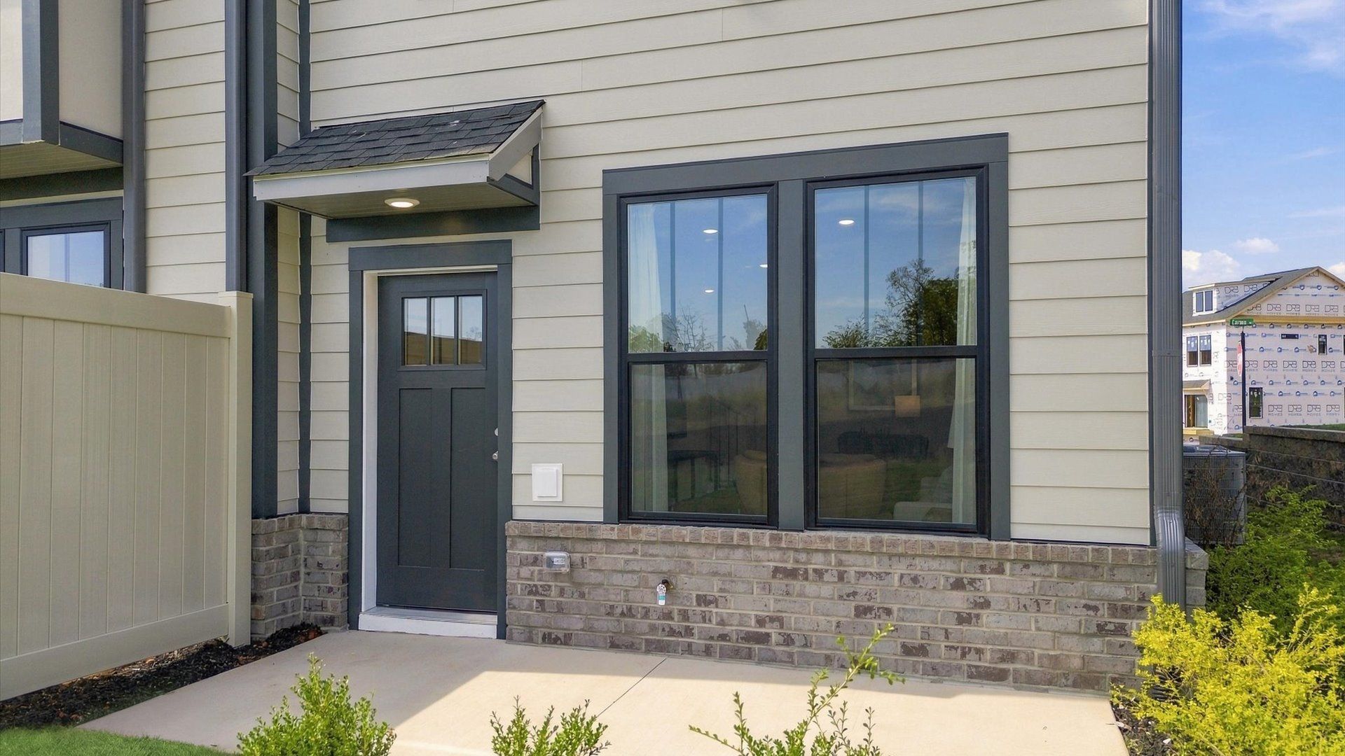 Exclusive DRB Homes rear exterior with balanced proportions and polished landscaping