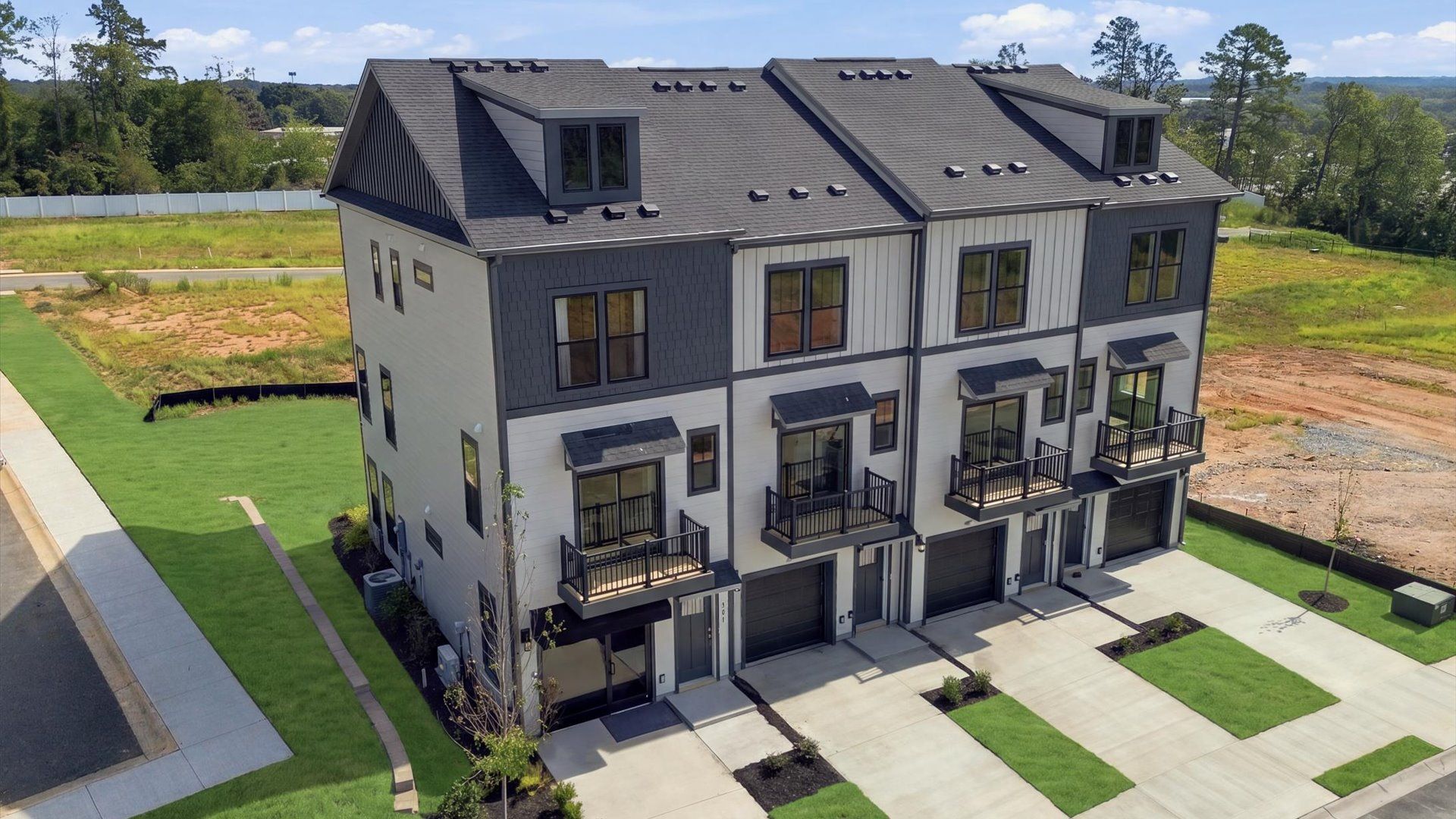 Notable street presence with tasteful elevation and thoughtful landscaping at the Traynham Place community