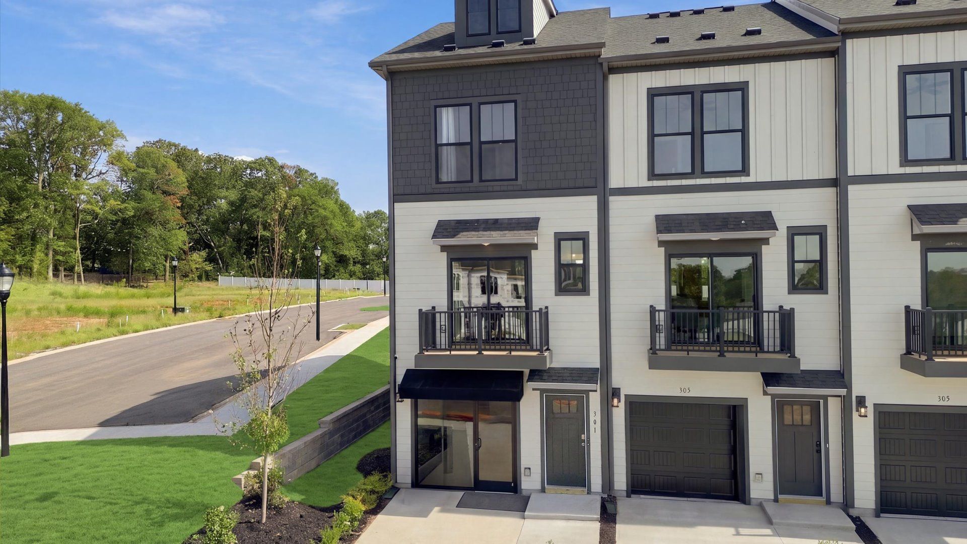Exceptional home with tasteful exterior finishes and a thoughtfully designed façade at Traynham Place