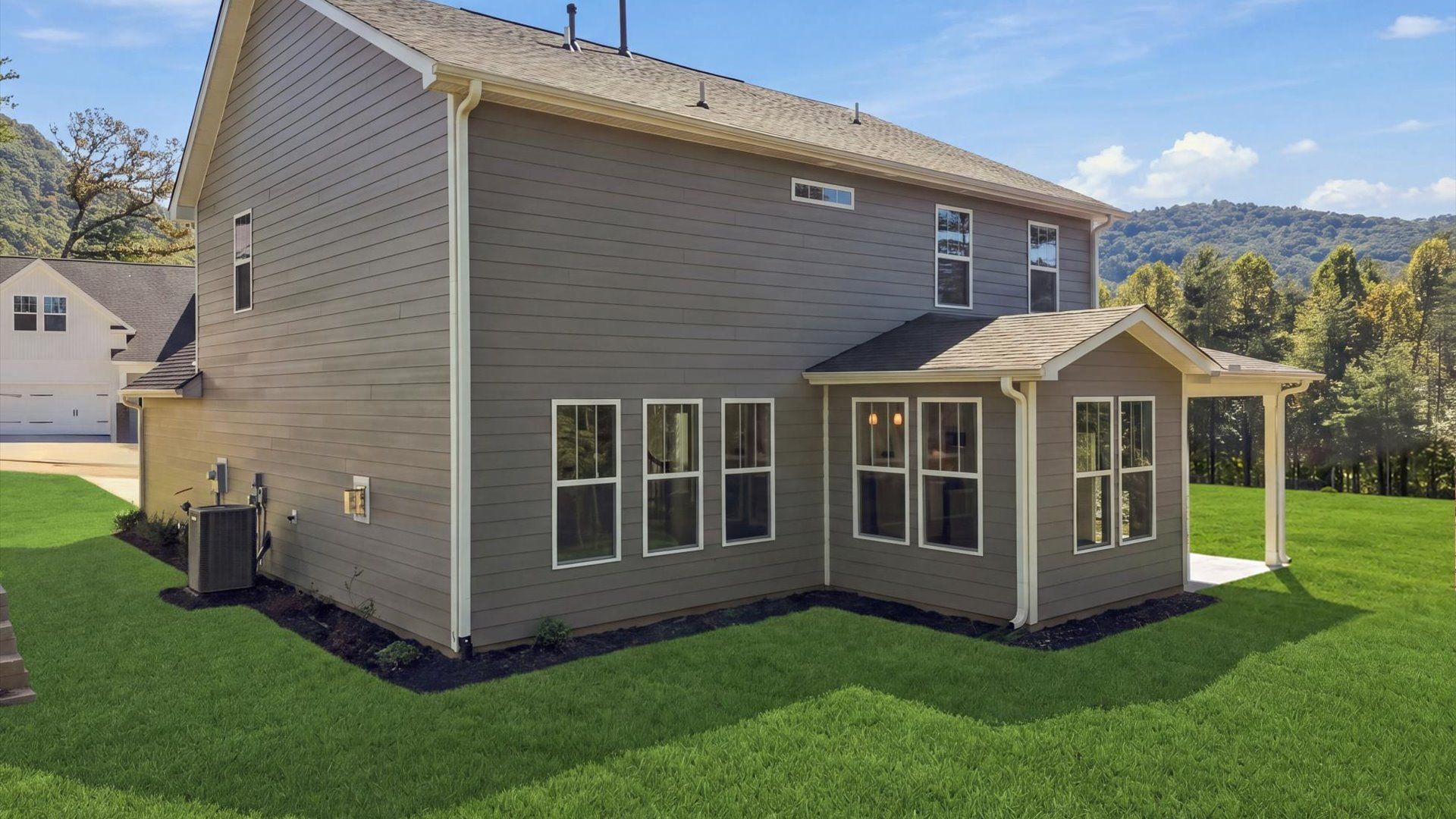Established charm meets functional outdoor living with a spacious rear covered porch by DRB Homes