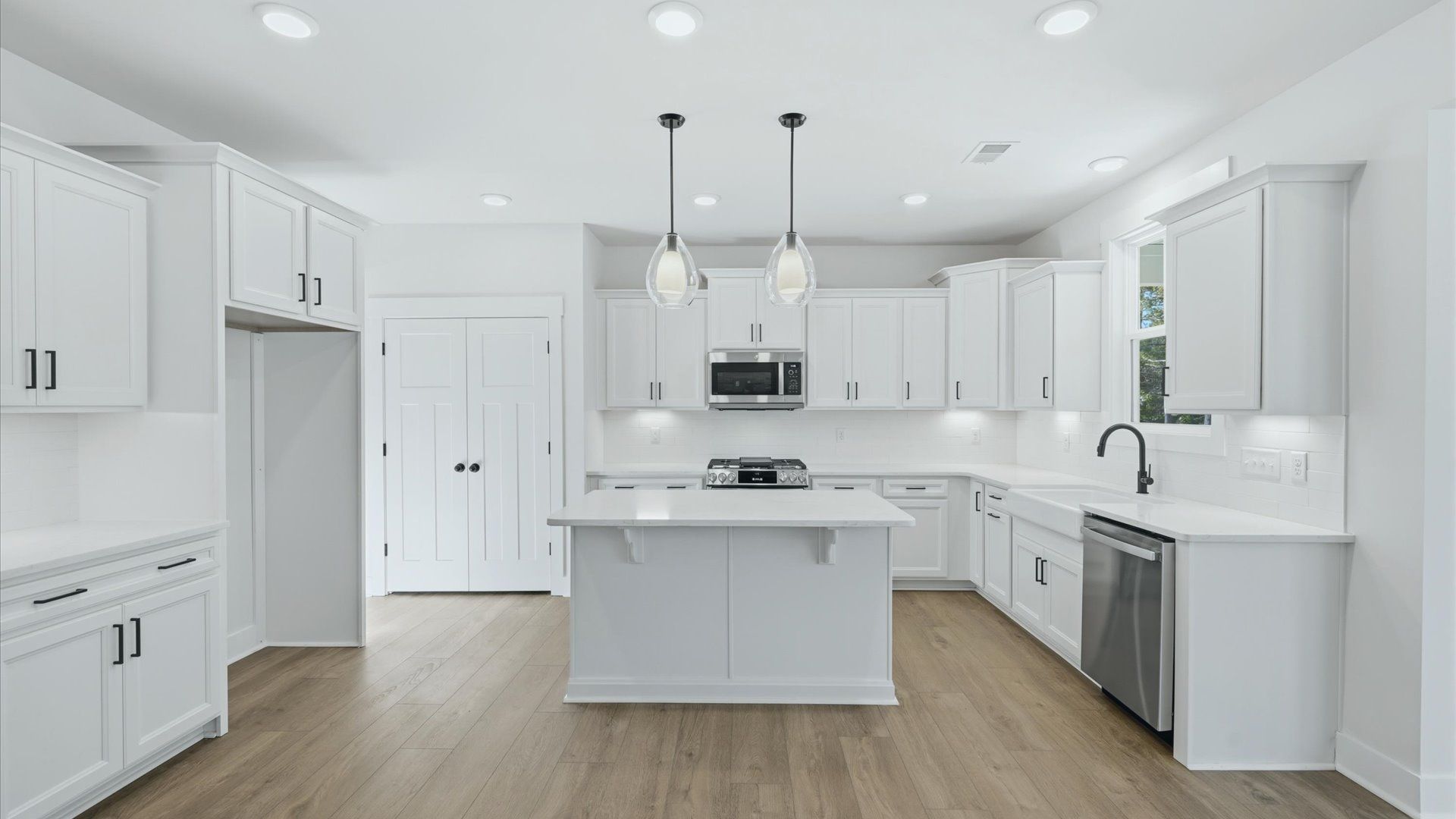Beautifully appointed kitchen with spacious counters and sophisticated detailing in Asheville, NC
