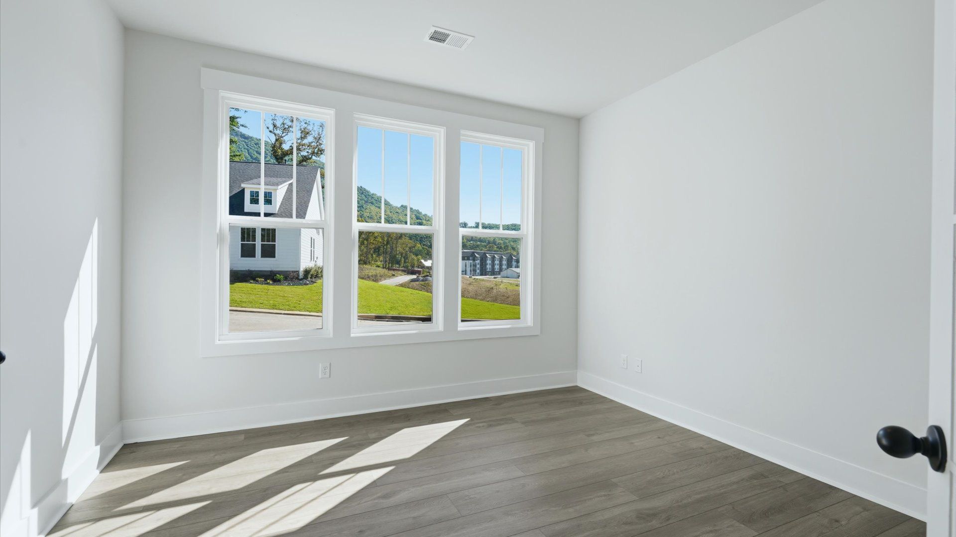 Superior craftsmanship meets practical luxury in this accomplished French door home office at The Wilds at Cedar Mountain