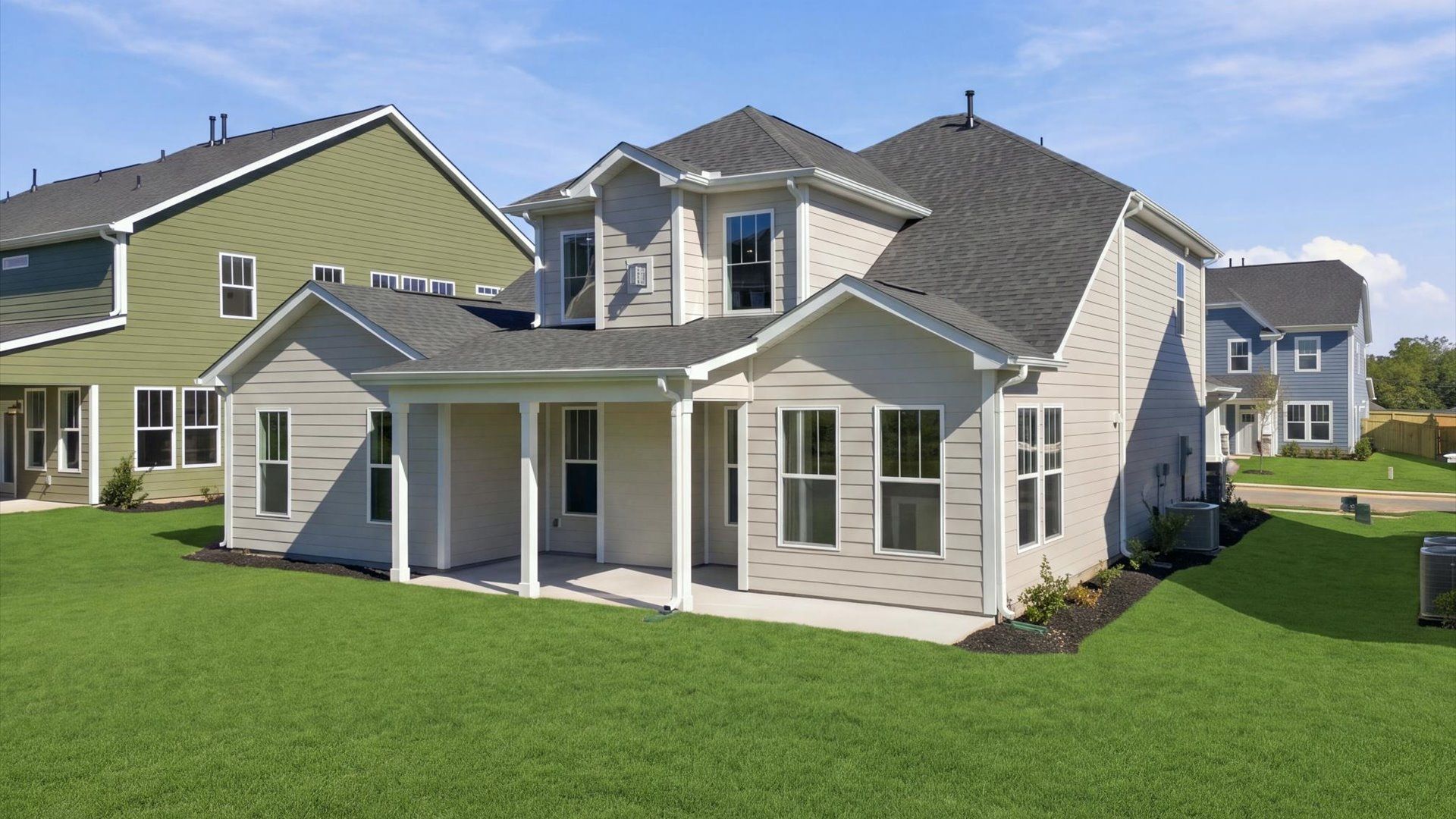 Established charm meets functional outdoor living with a spacious rear covered porch at Kayfield at Midway