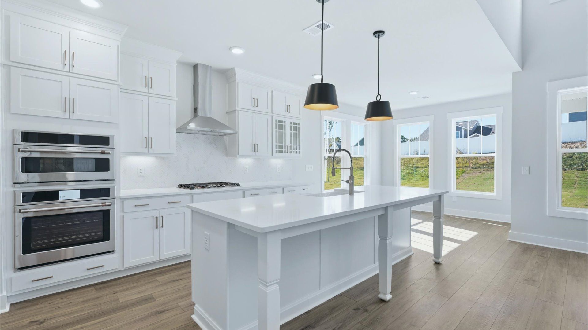 Well-designed kitchen with a center island and tasteful finishes that elevate everyday living near Downtown Anderson