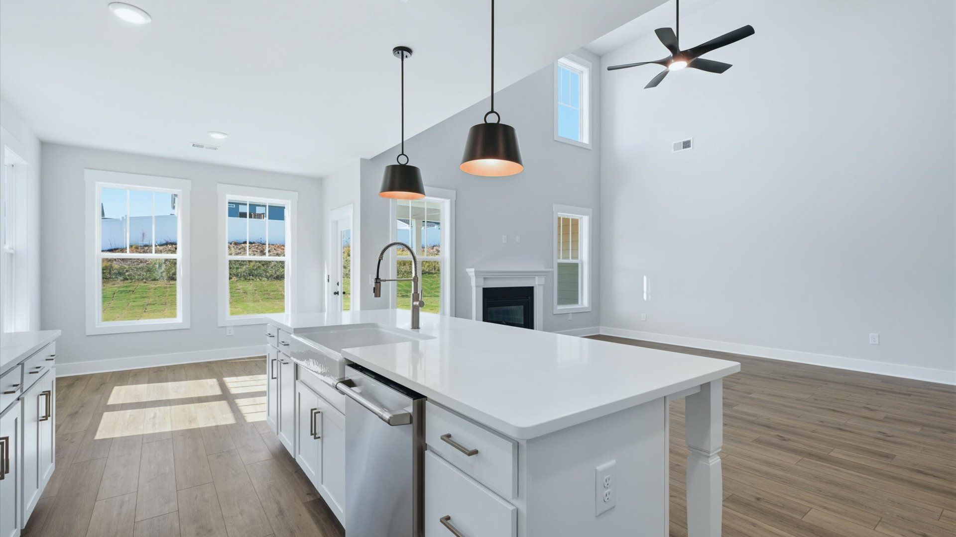 Exclusive kitchen design with large island, pendant lights, and tasteful finishes throughout near Downtown Anderson