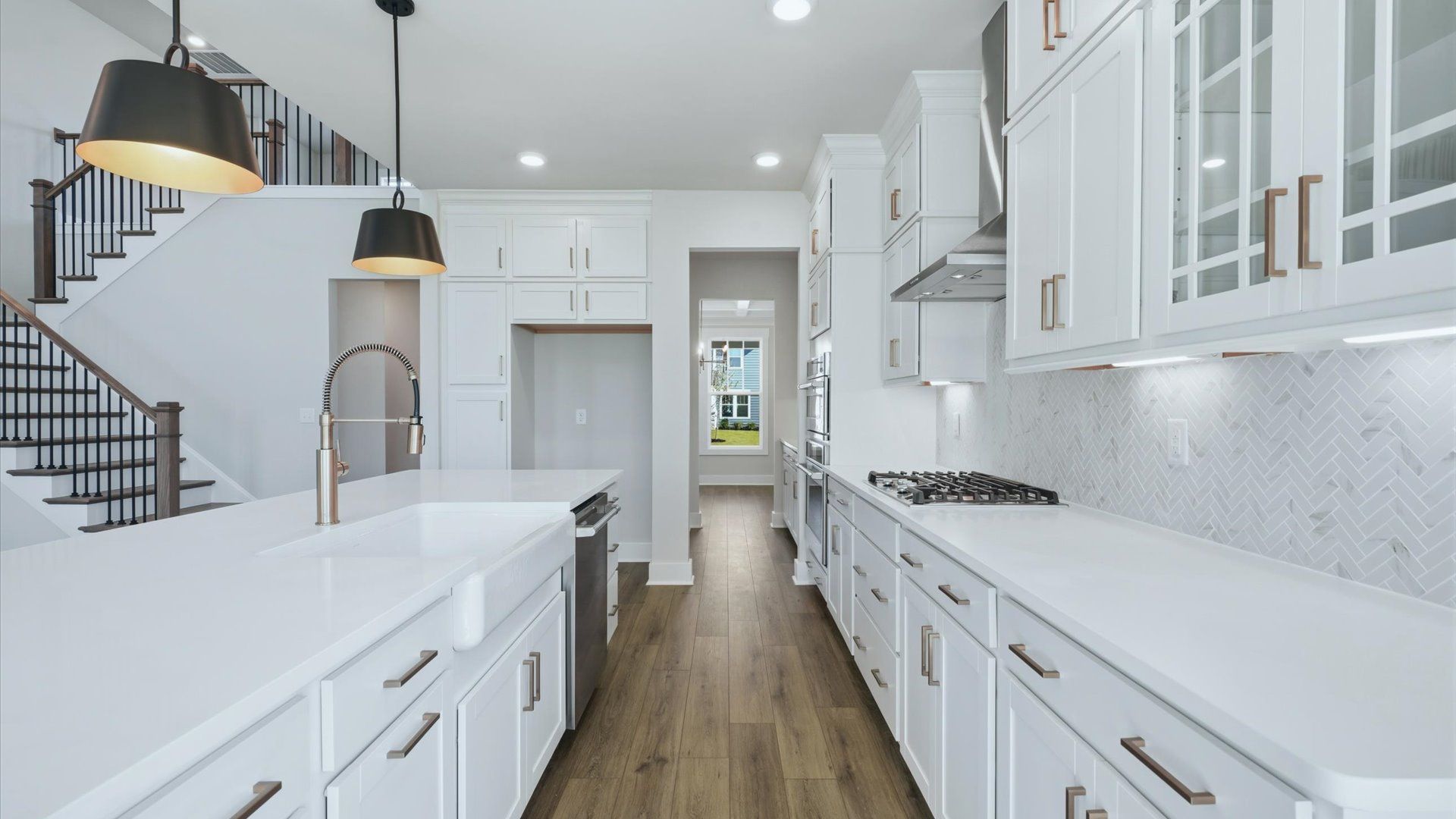Luxury-inspired kitchen featuring expansive prep space and elegant design elements near Lake Hartwell