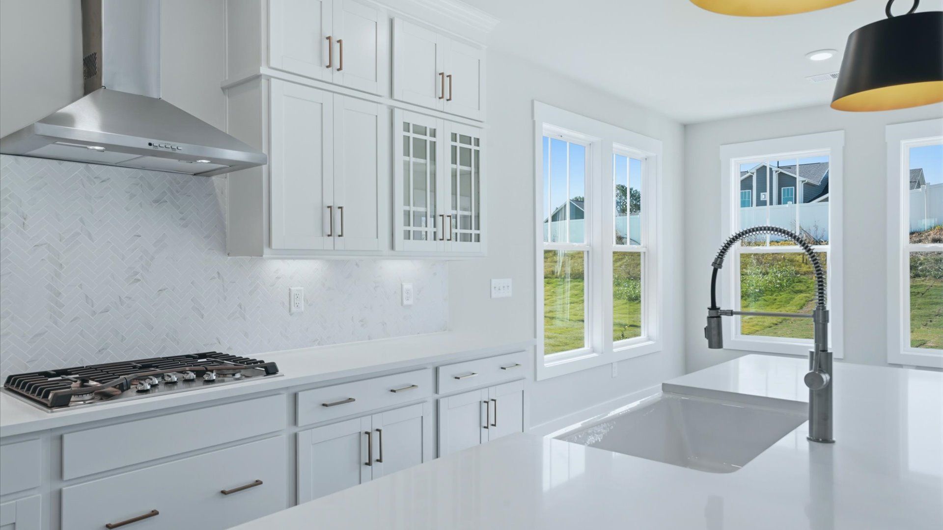 First-class finishes and a thoughtfully scaled island highlight this elegant kitchen space by DRB Homes